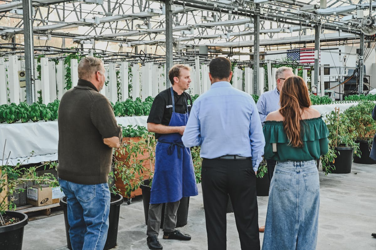 a group of people standing in front of a building