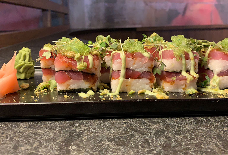 a bunch of sushi on a table