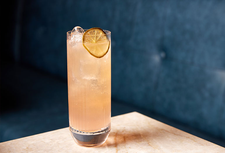 a glass of beer on a table