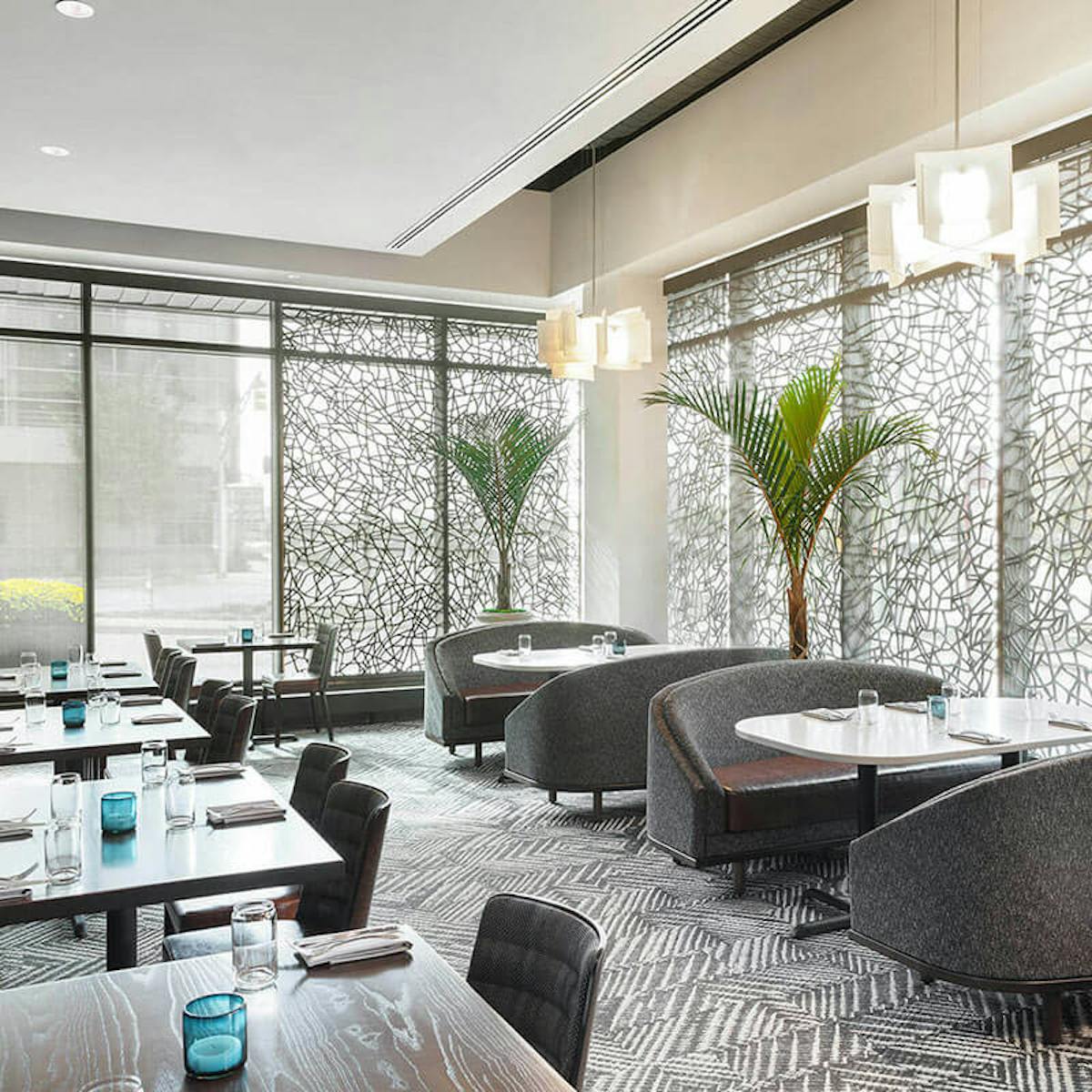 a room filled with furniture and a large window