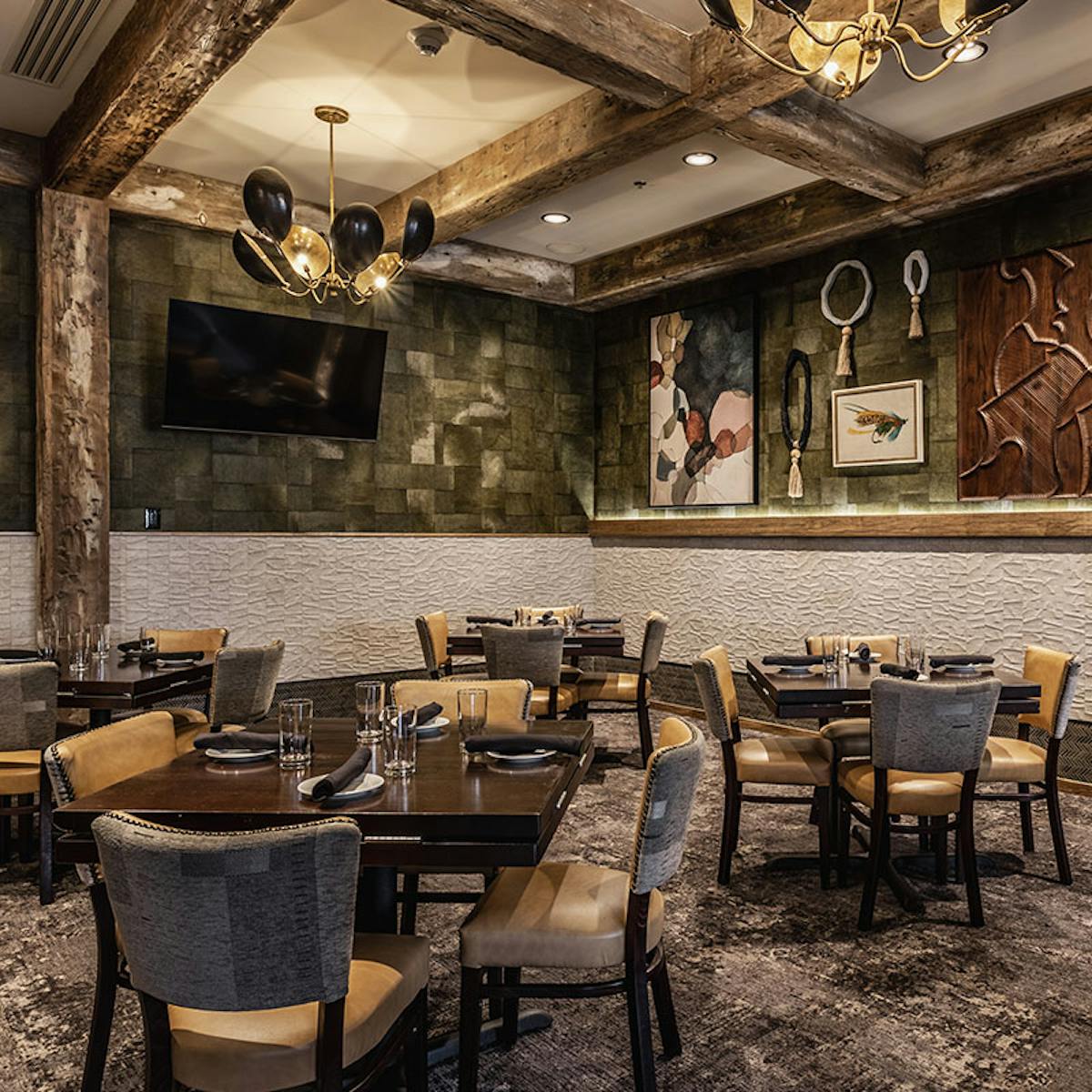 a room filled with furniture and a table in a restaurant