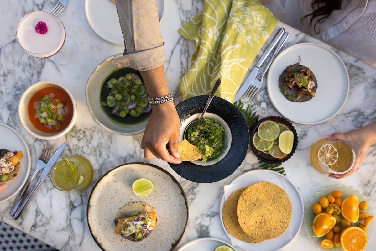 a bowl of food sitting on a table
