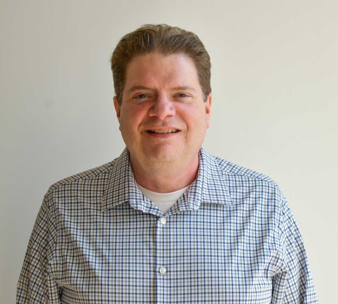 a man in a plaid shirt