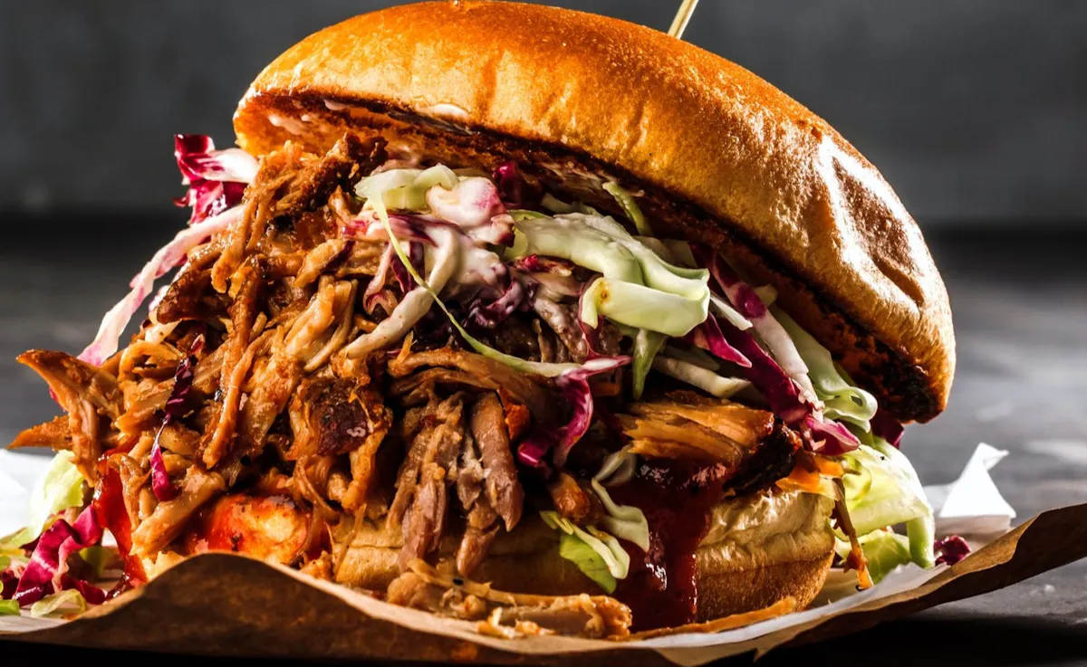 a sandwich sitting on top of a plate of food