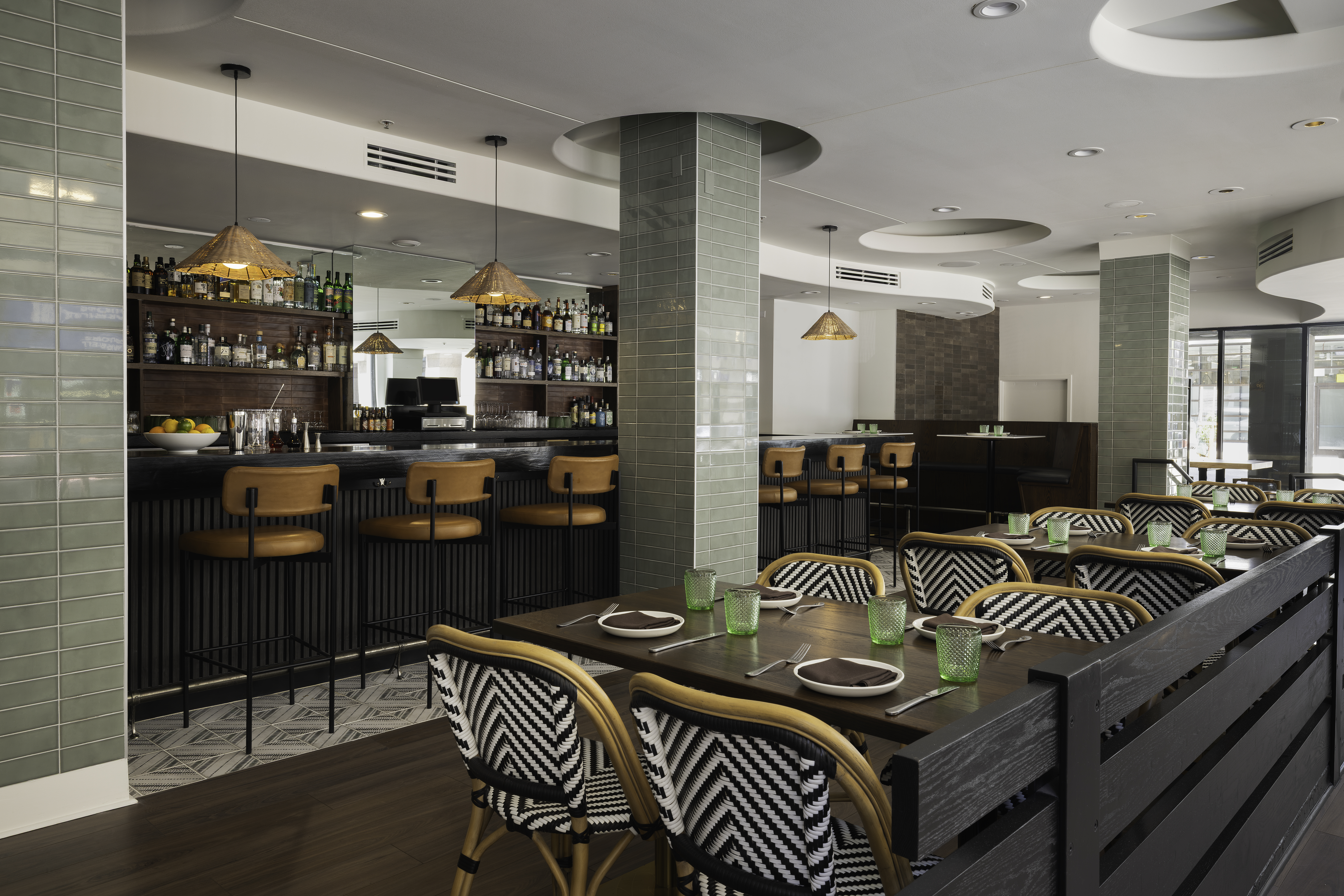 a restaurant with tables and chairs