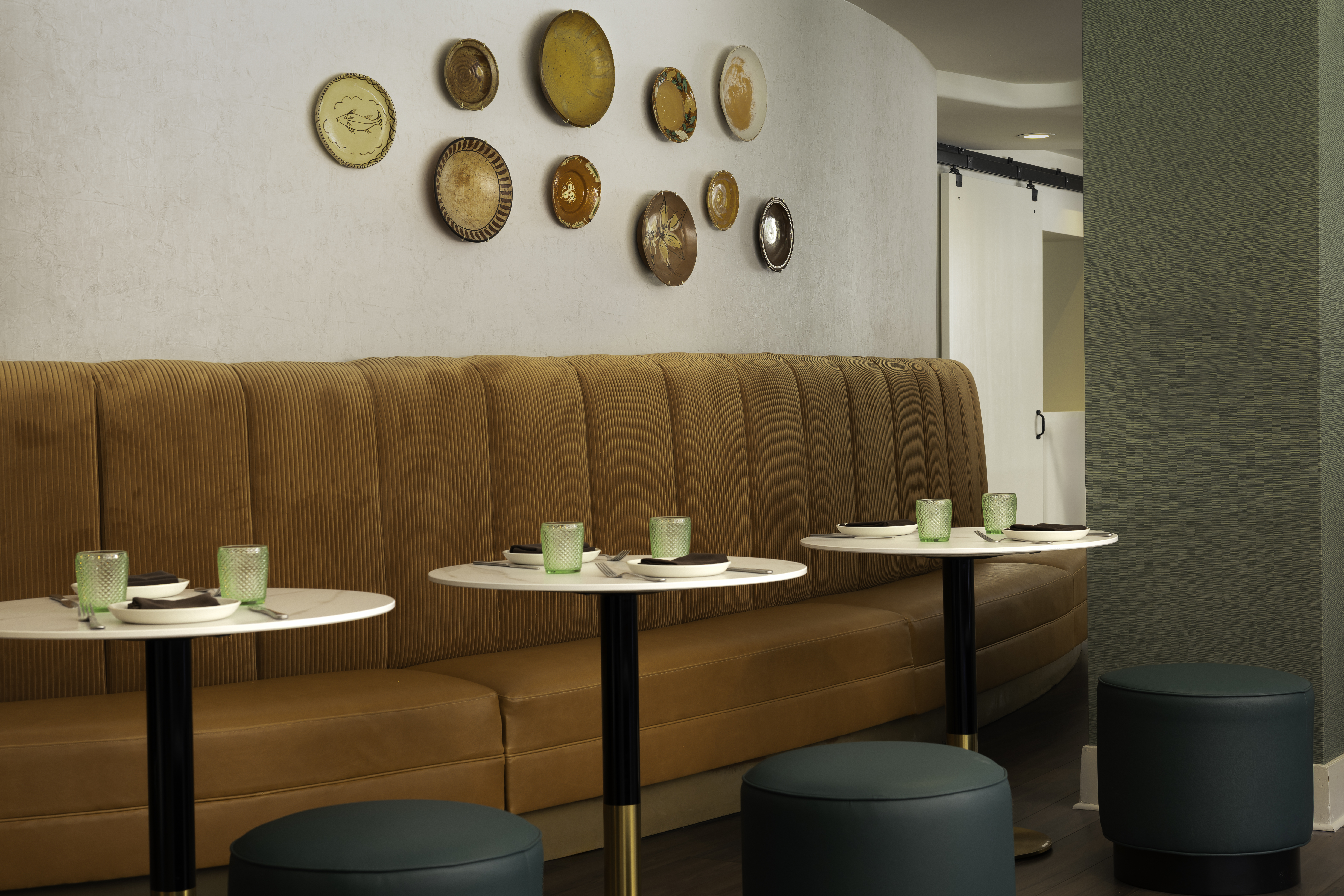 a table with plates on the wall