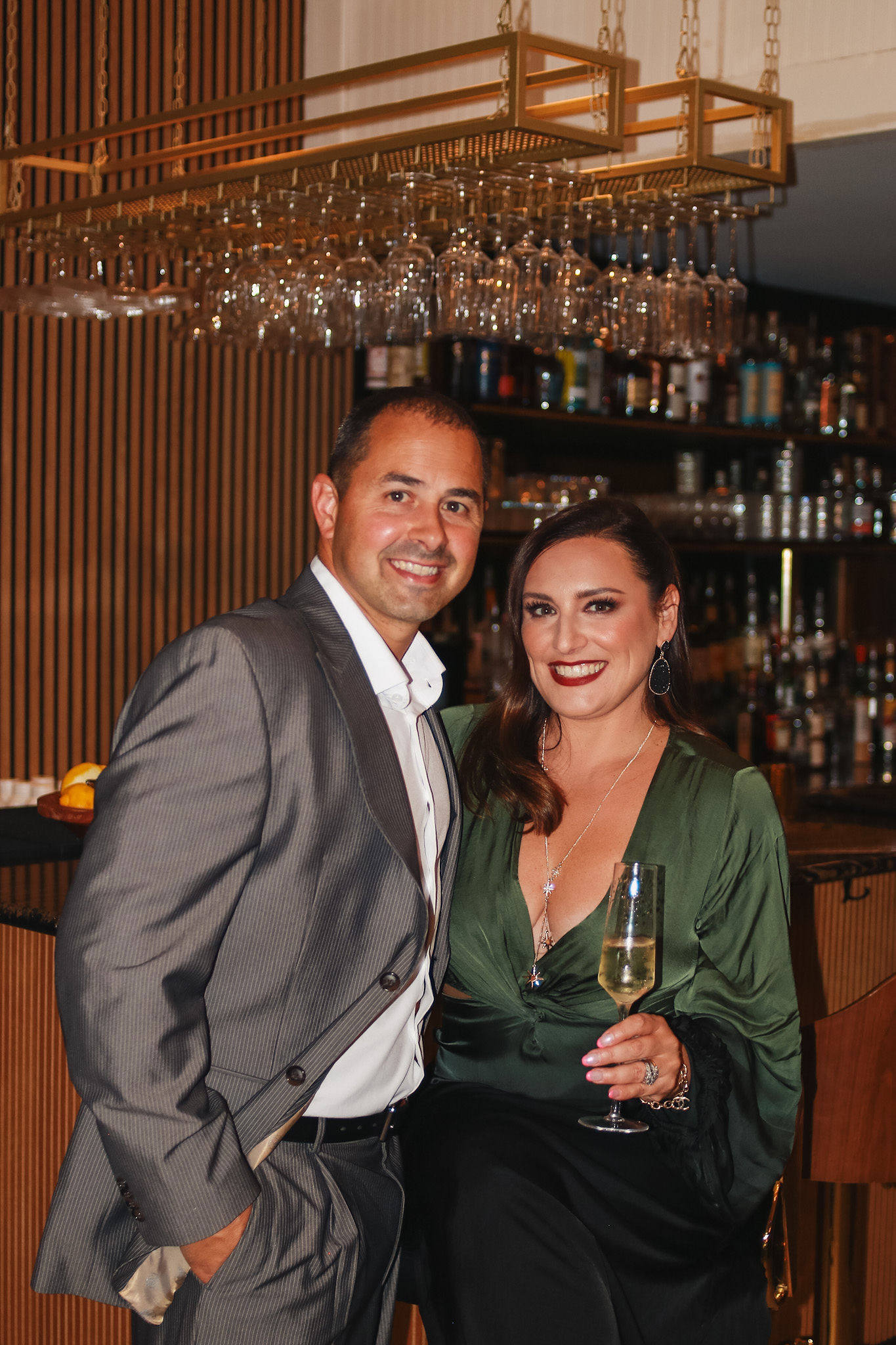 a group of people holding wine glasses