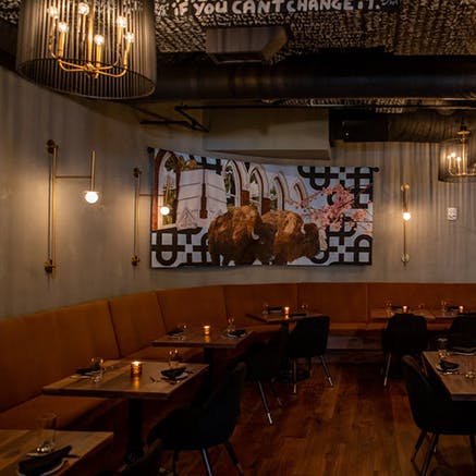 a large room with tables and chairs