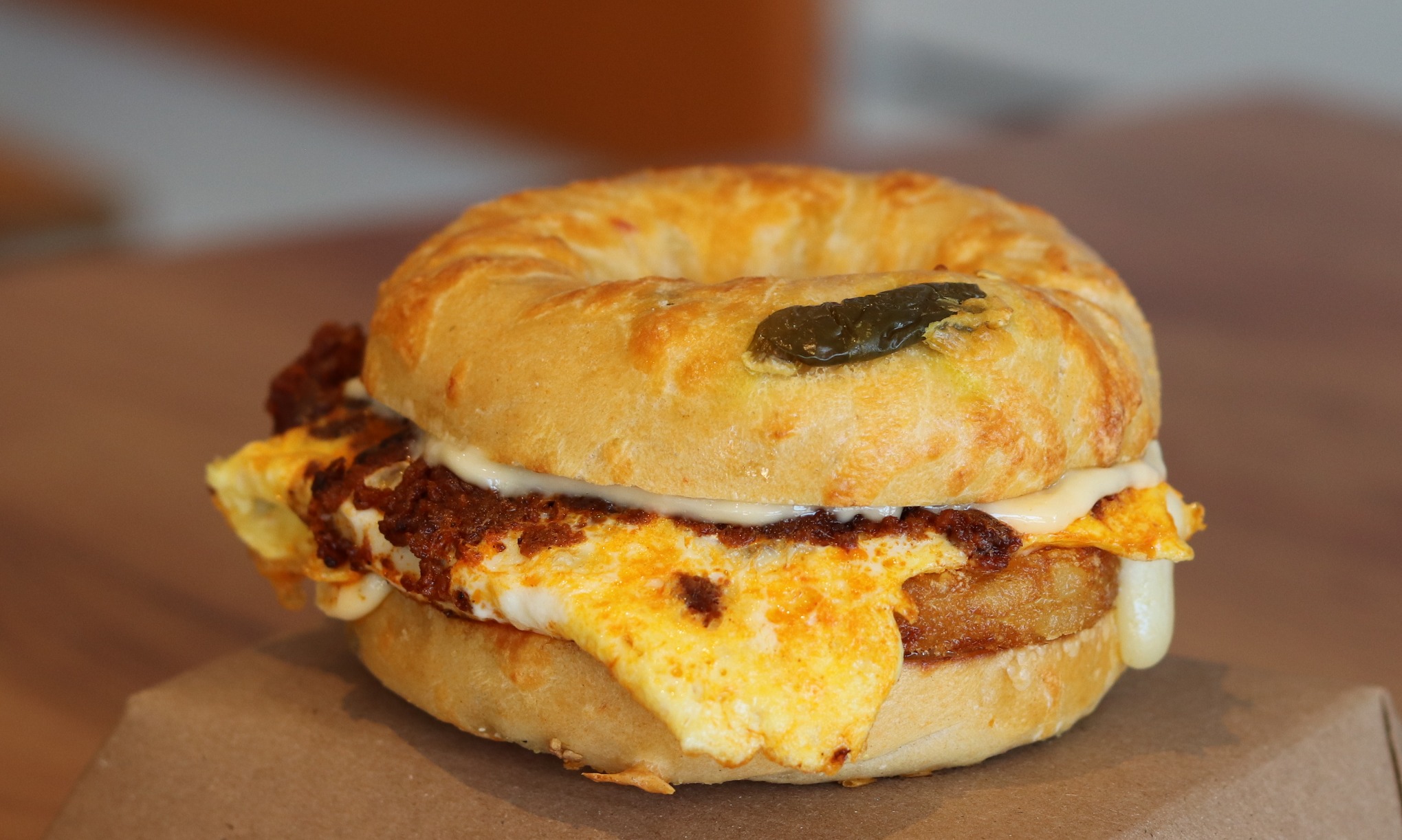 a bagel sandwich with egg and cheese