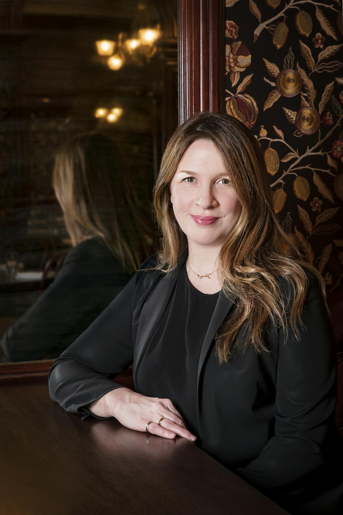 a woman sitting on a table