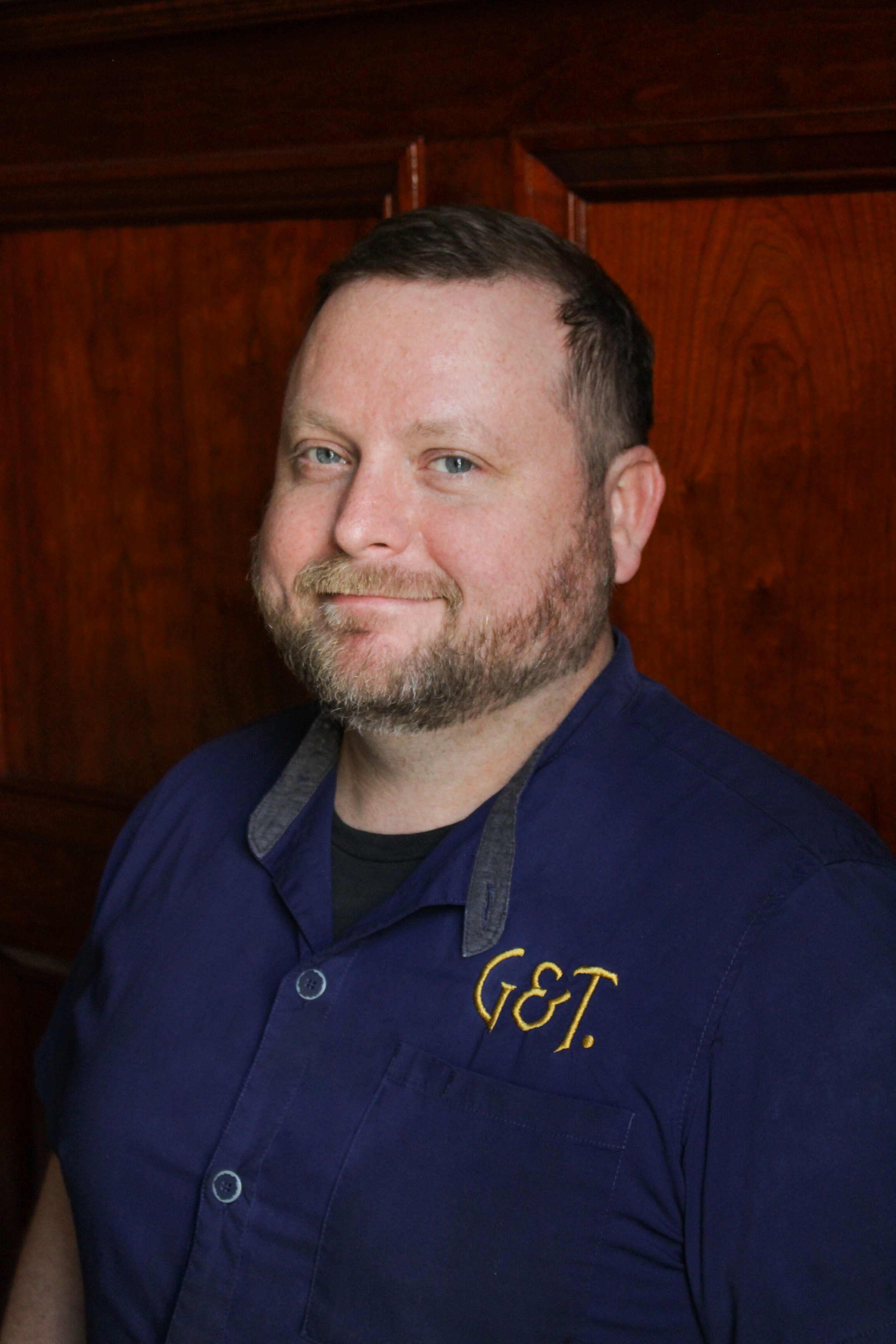 a man in a blue shirt