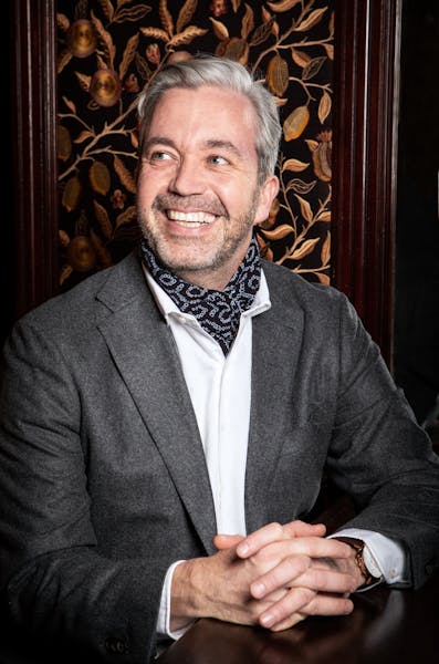 a man wearing a suit and tie
