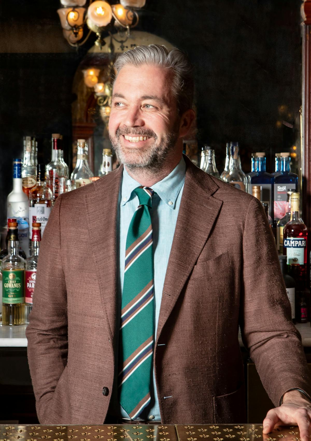 Adam Yauch wearing a suit and tie