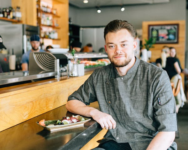 a man sitting on a table