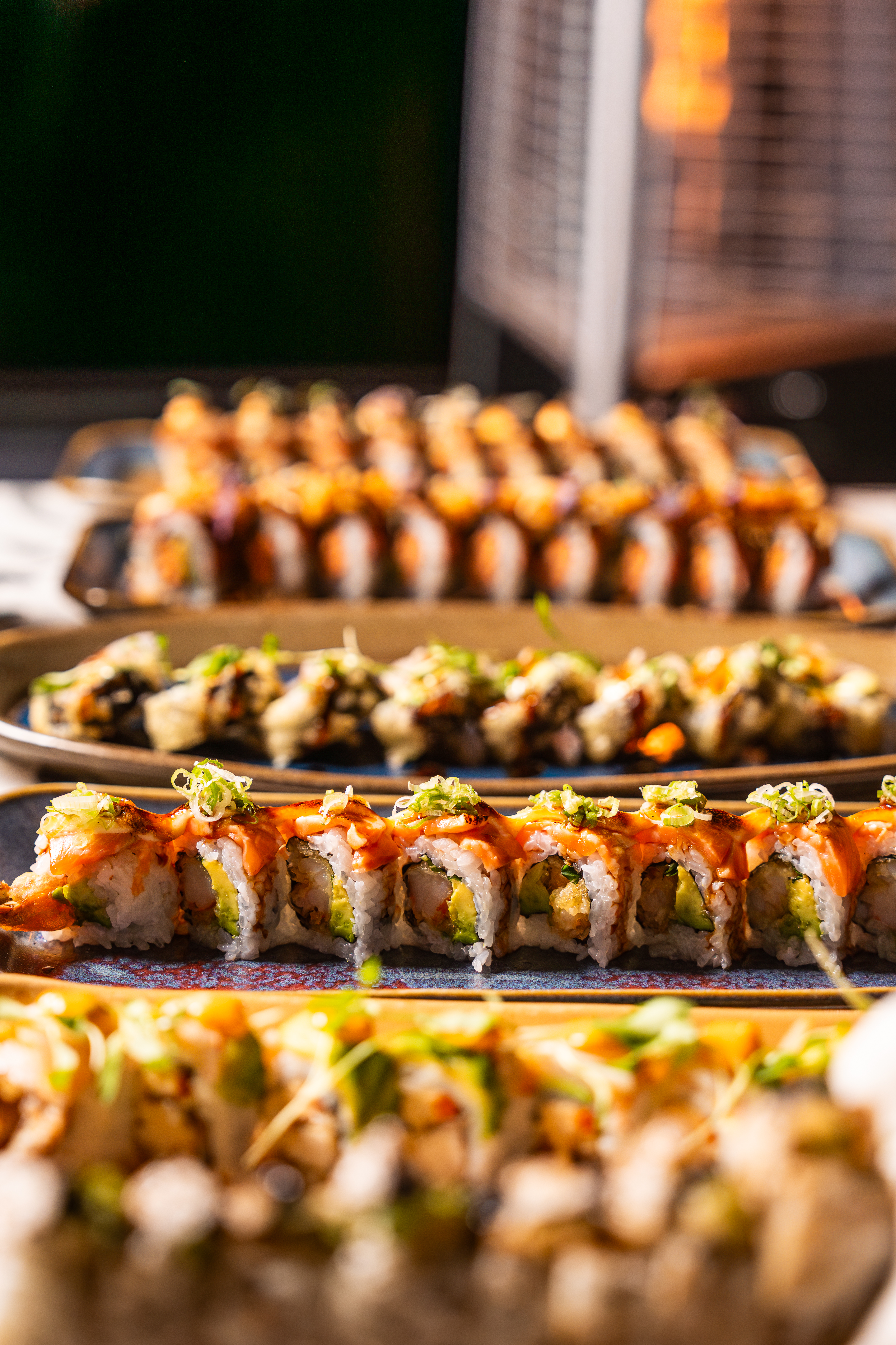Fresh sushi rolls and seafood dishes at Lionfish San Diego