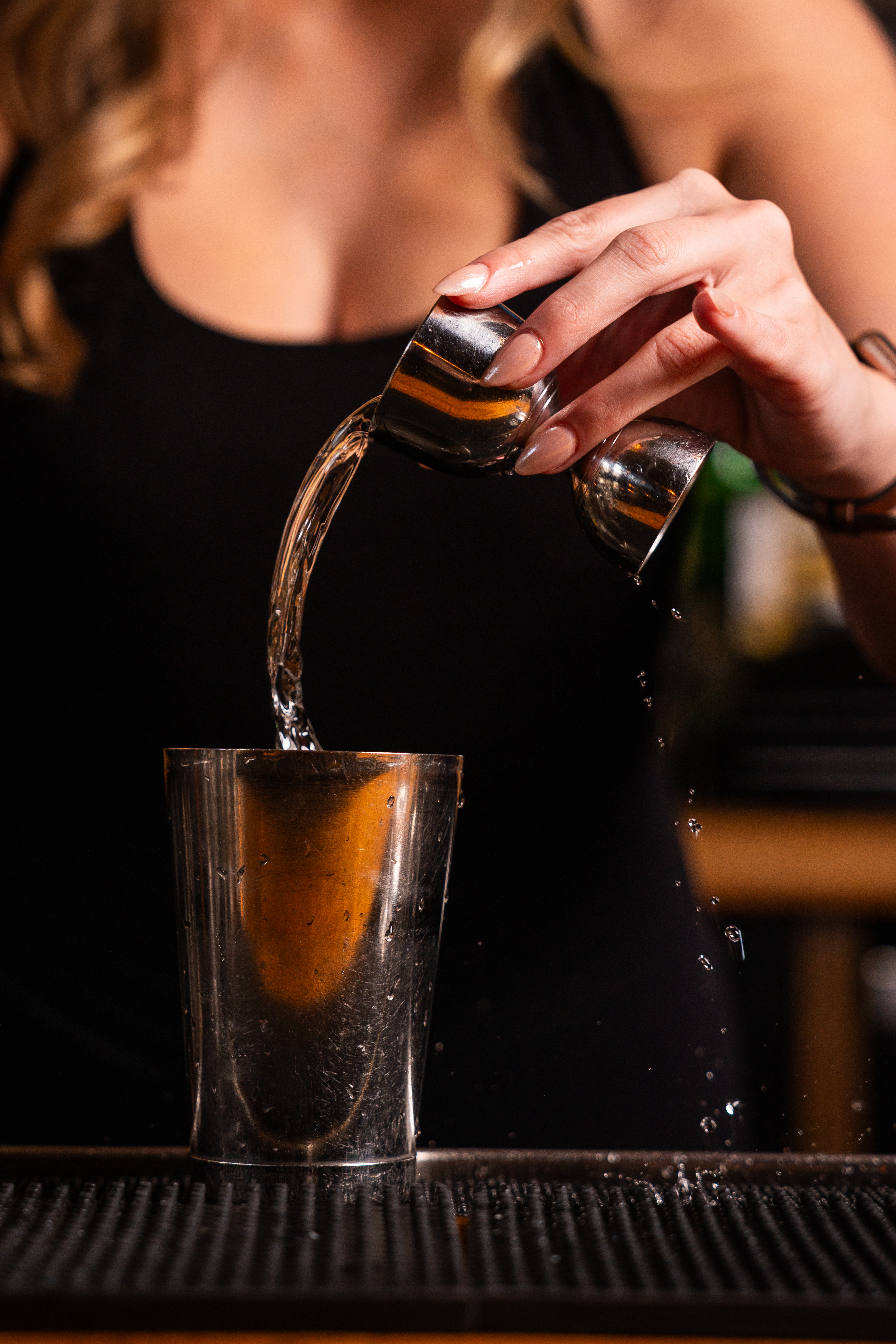 Interior of Lionfish San Diego seafood restaurant in the Gaslamp District featuring modern coastal design, sushi, and fresh seafood dishes.