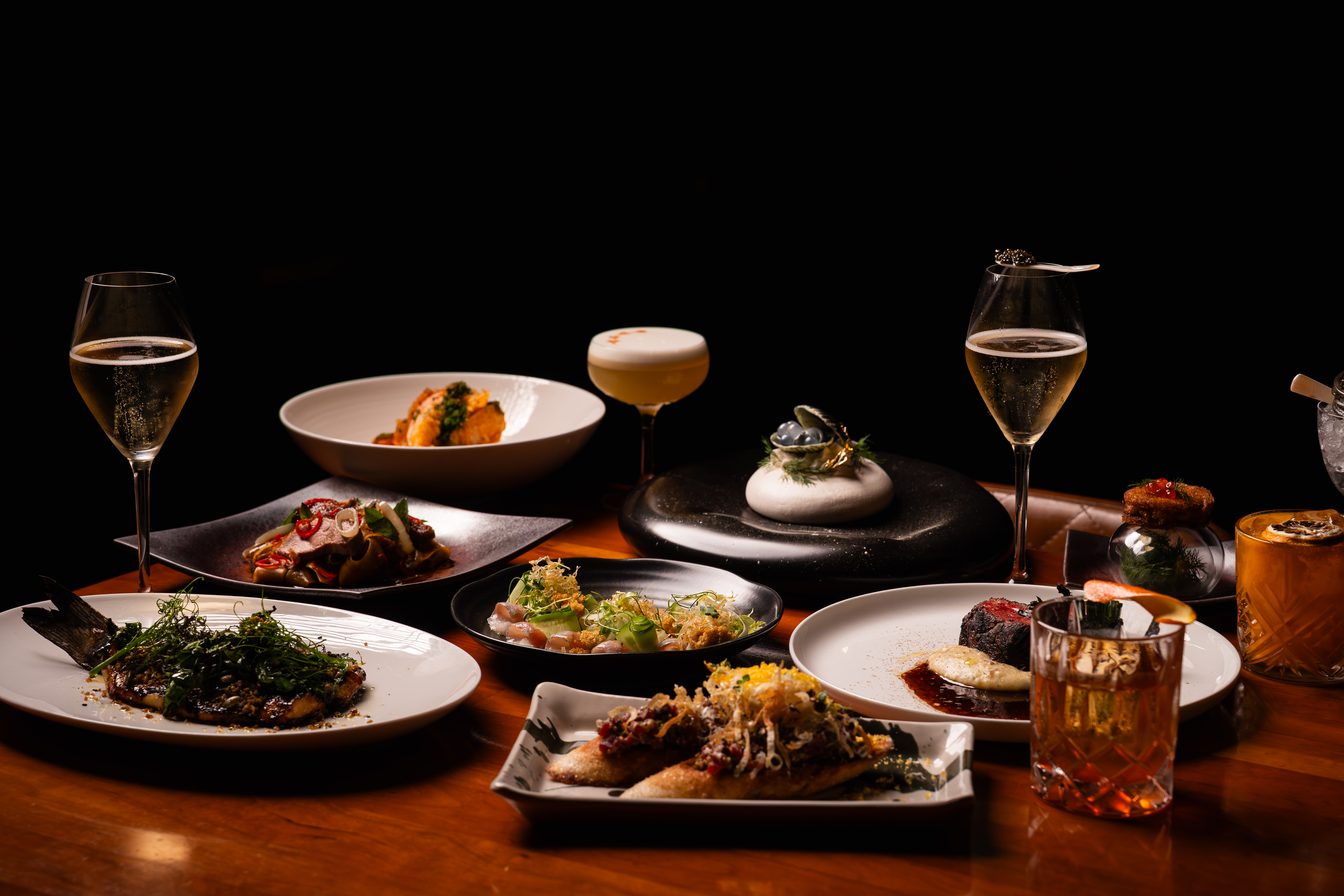 Fresh seafood dishes at Lionfish in Gaslamp San Diego including oysters, sushi, and coastal-inspired entrees at a top Downtown San Diego seafood restaurant