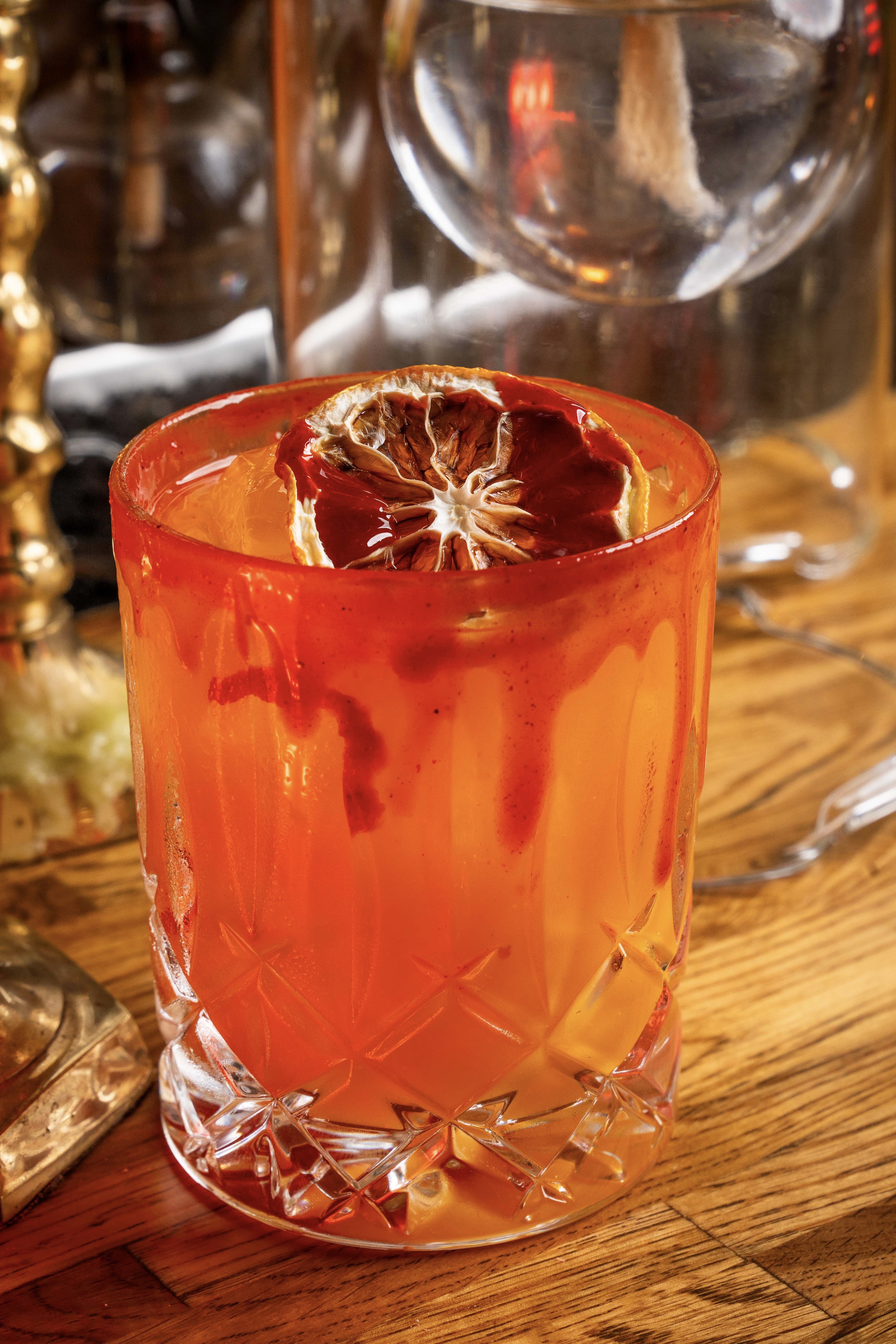 Lionfish Halloween cocktails in Gaslamp San Diego including Pretty Poison, Black Widow, The Bite, and PSM paired with fresh seafood in Downtown San Diego