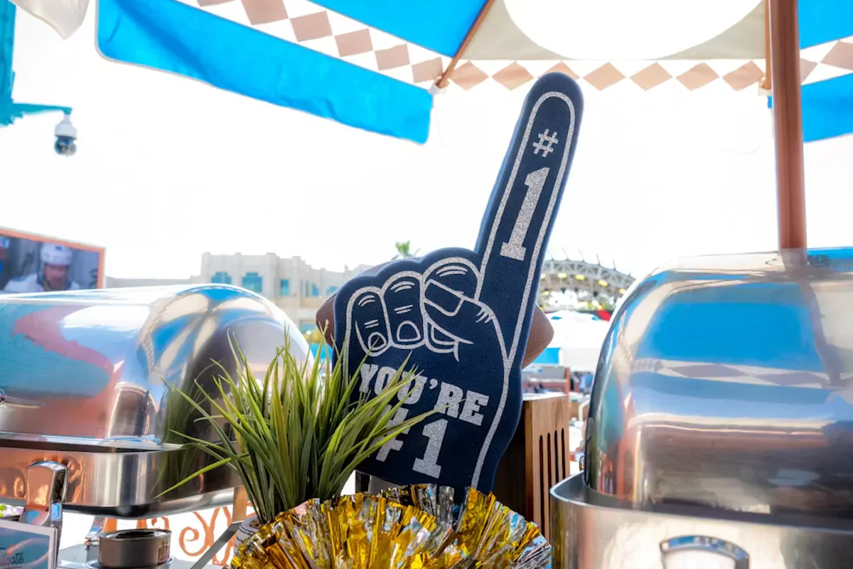Number-one foam finger and grill station detail at Tailgate Beach Club