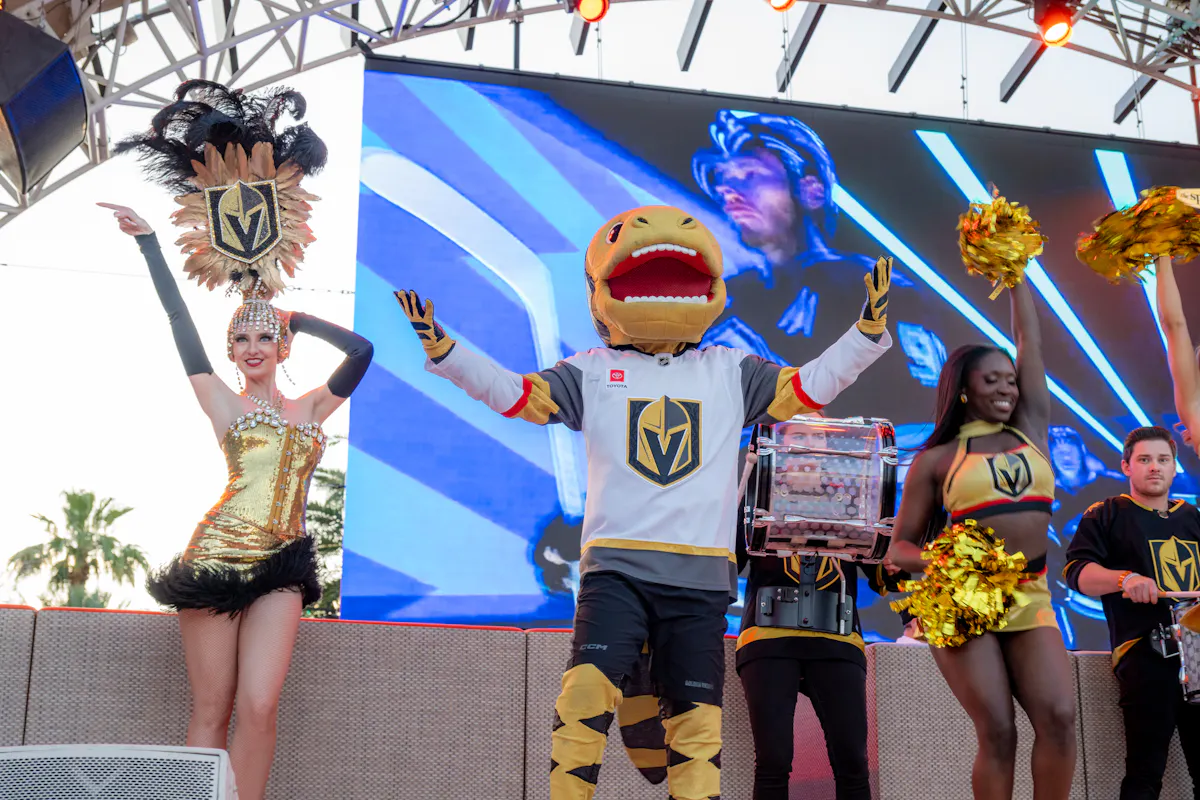 Golden Knights mascot and cheerleaders on stage at Tailgate Beach Club