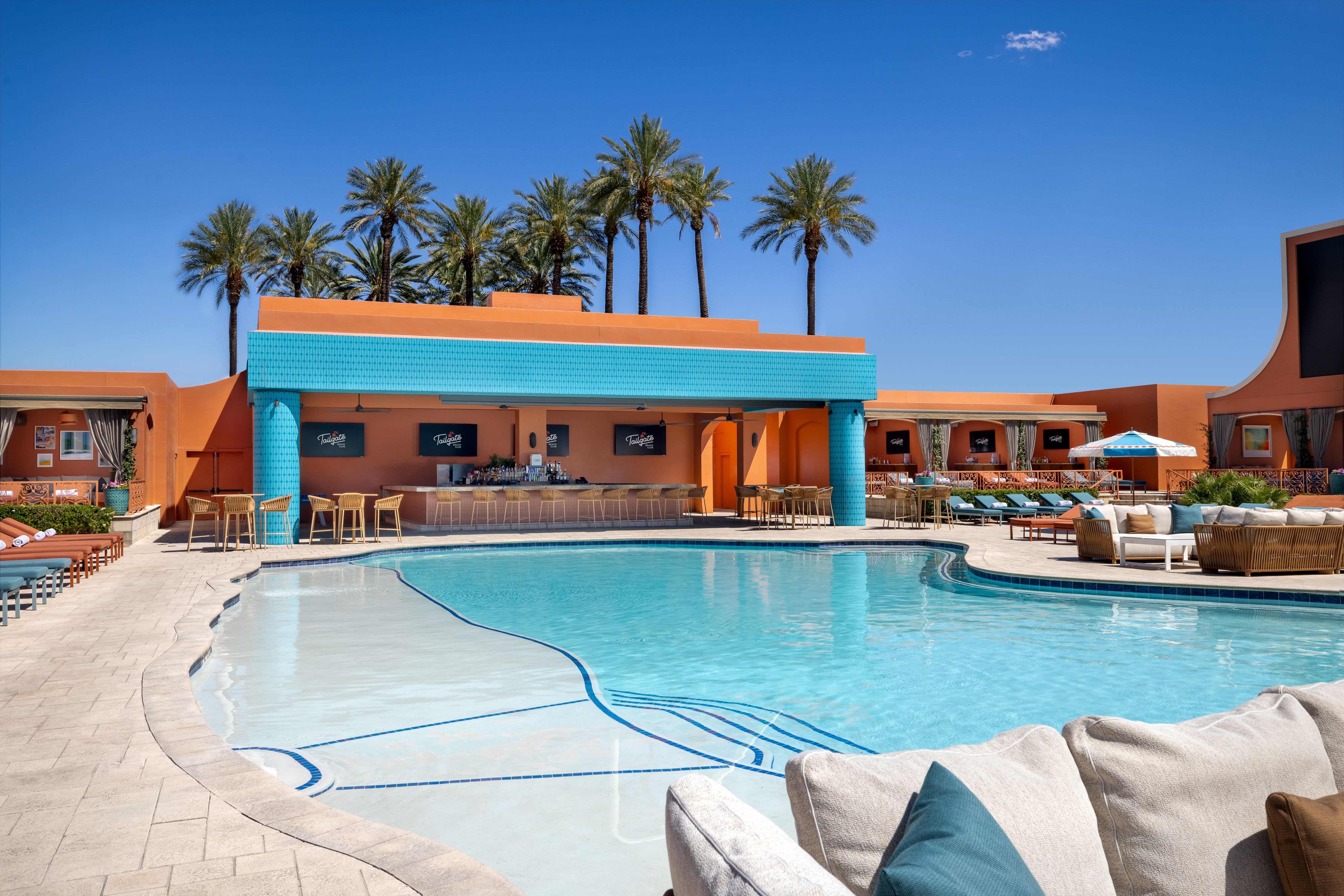 Tailgate Beach Club sports bar and poolside drink service