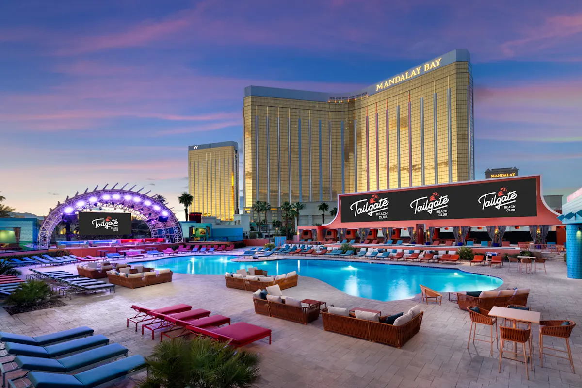 Tailgate Beach Club pool deck with stage and Mandalay Bay behind