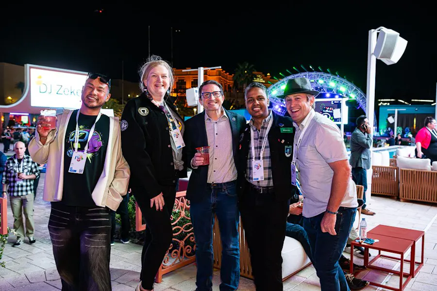 Group of friends celebrating together at a night event