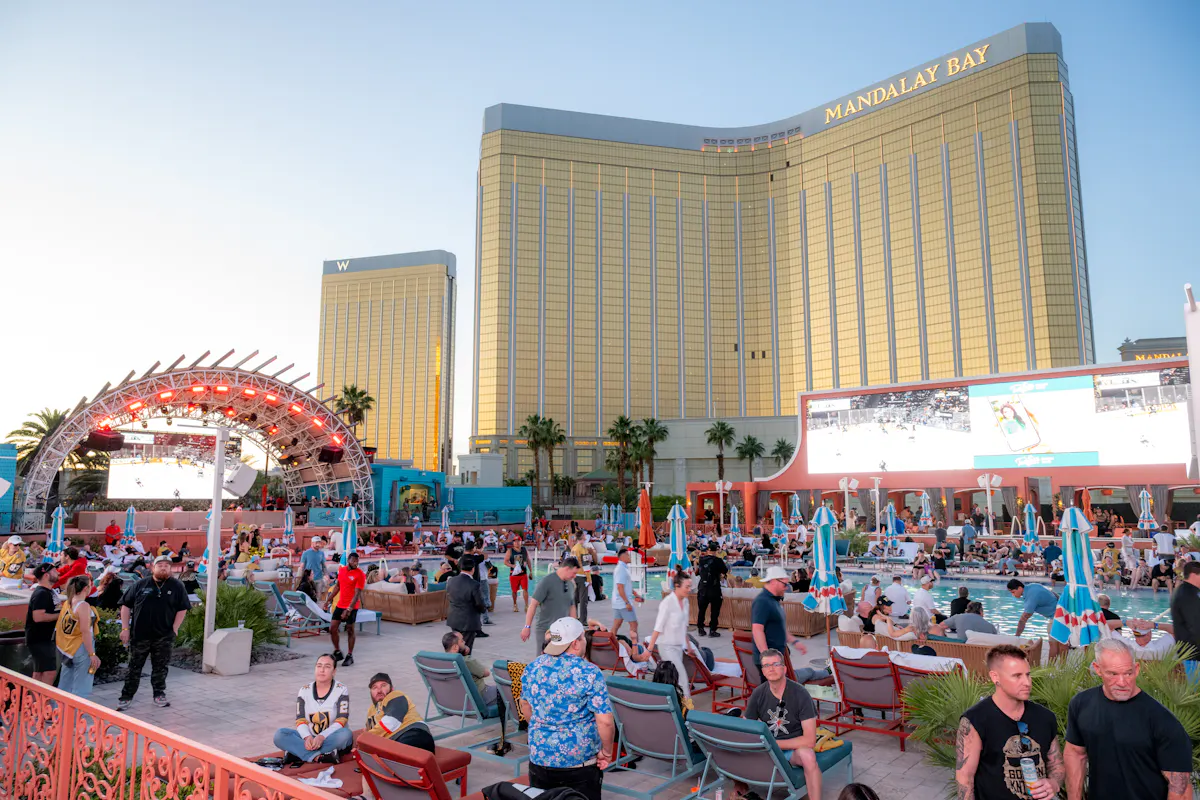 Packed watch party under Mandalay Bay and big screen at Tailgate Beach Club