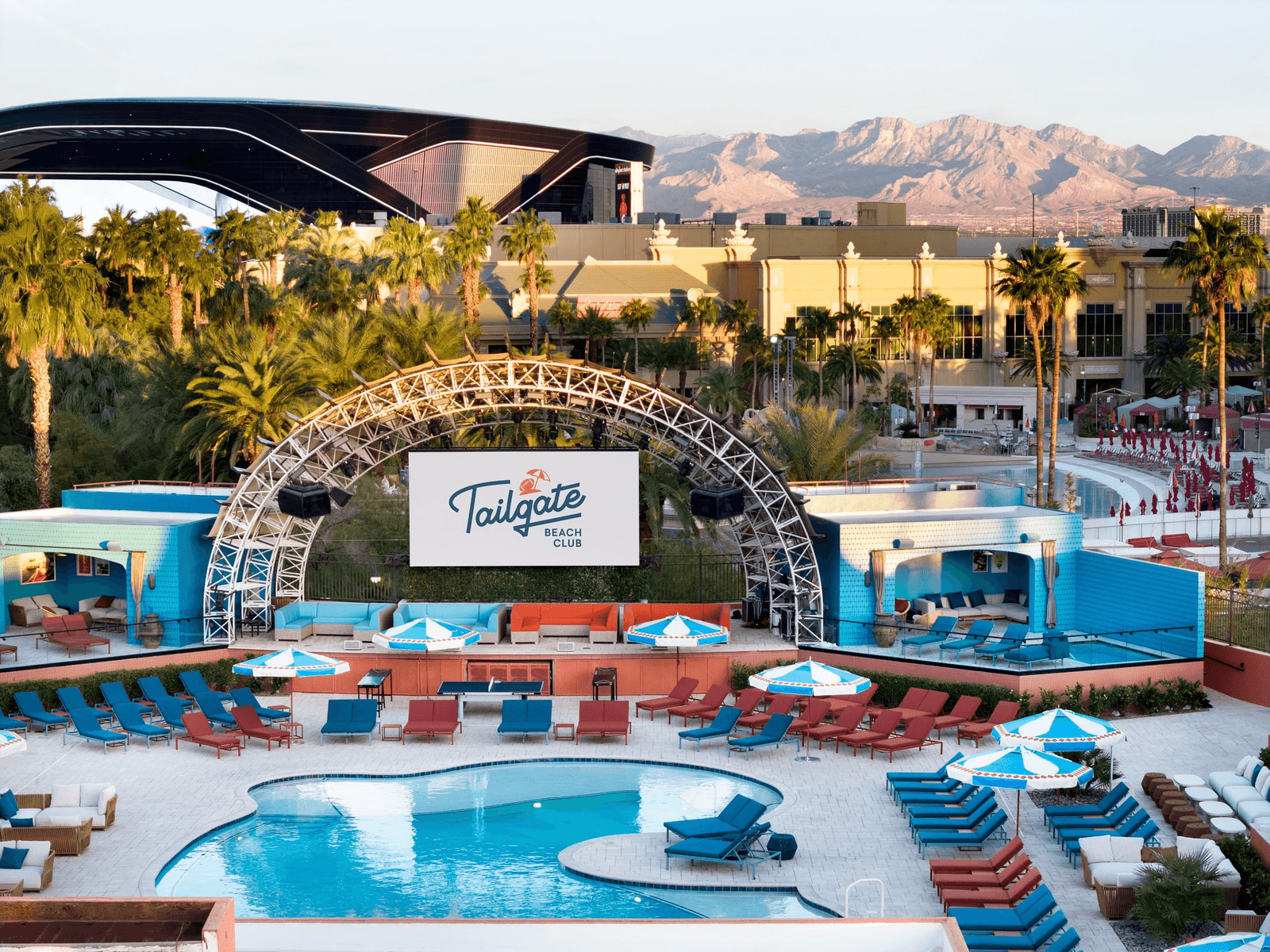 Pool deck and cabanas at Tailgate Beach Club
