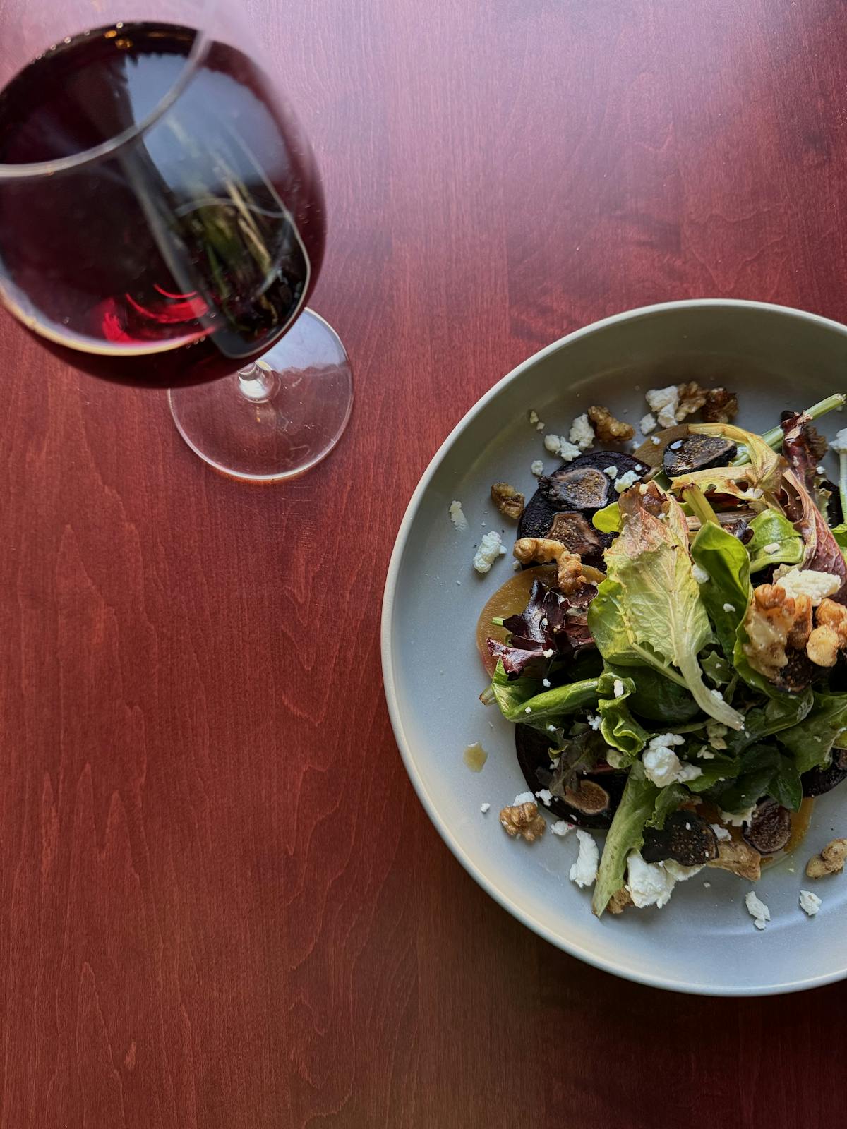 a bowl of salad on a plate