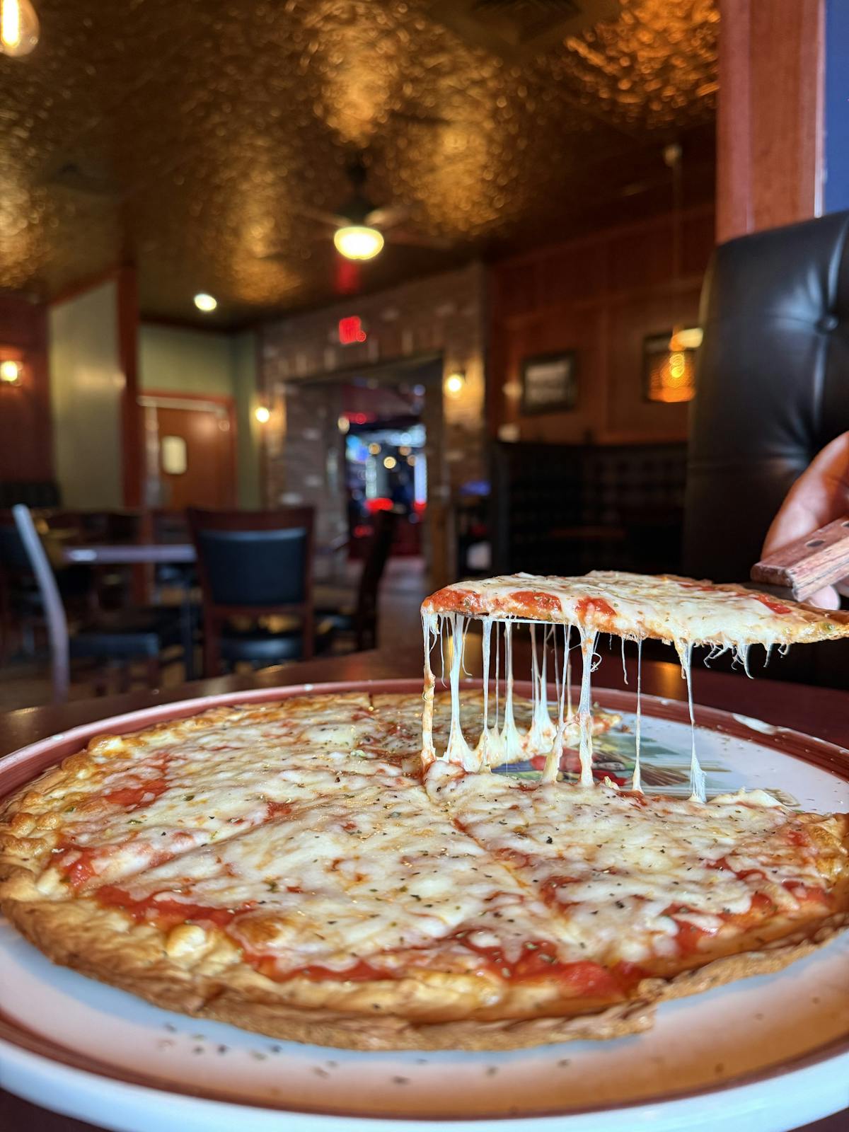 a pizza sitting on top of a table