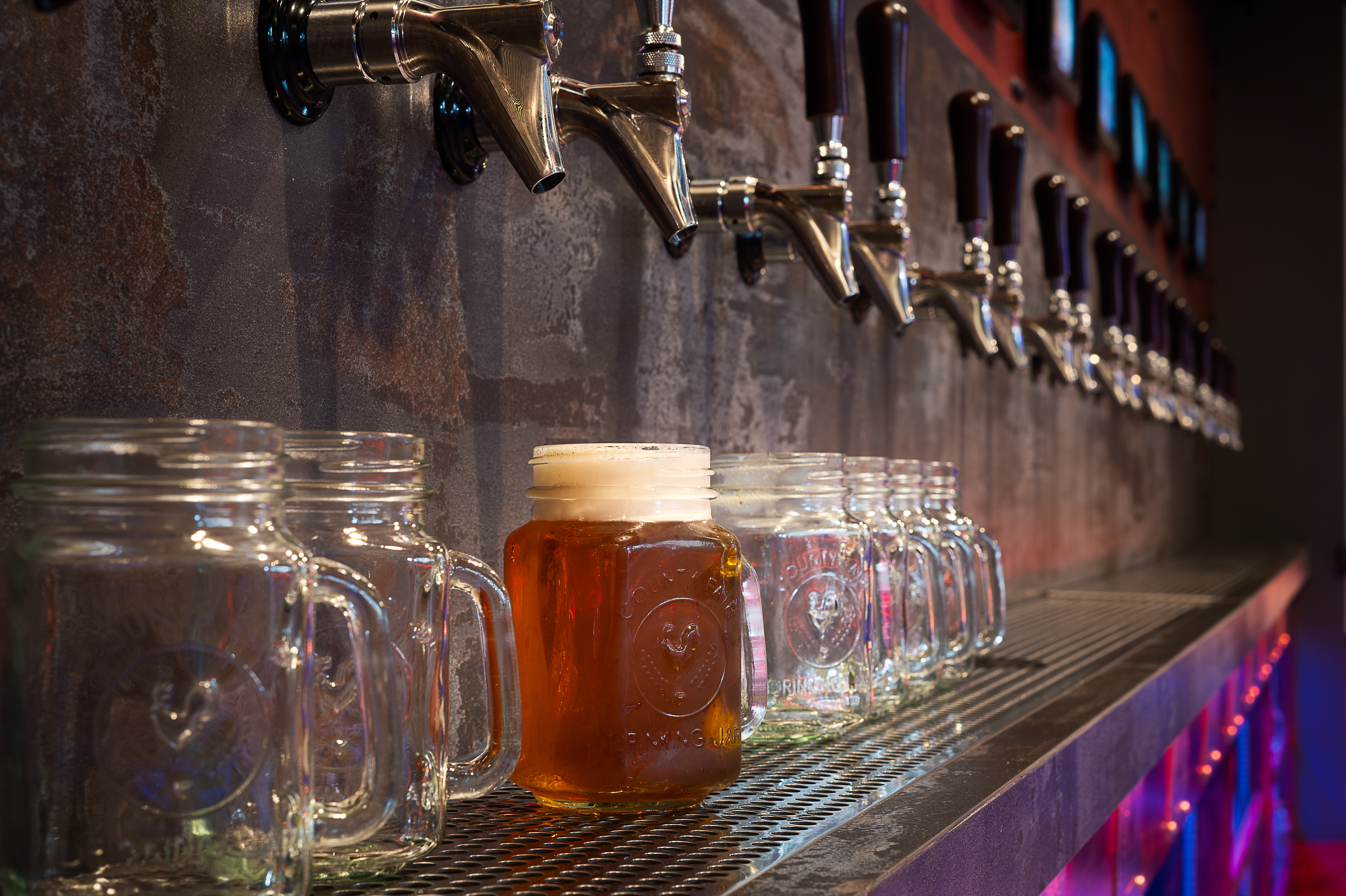 a group of glass bottles on a table