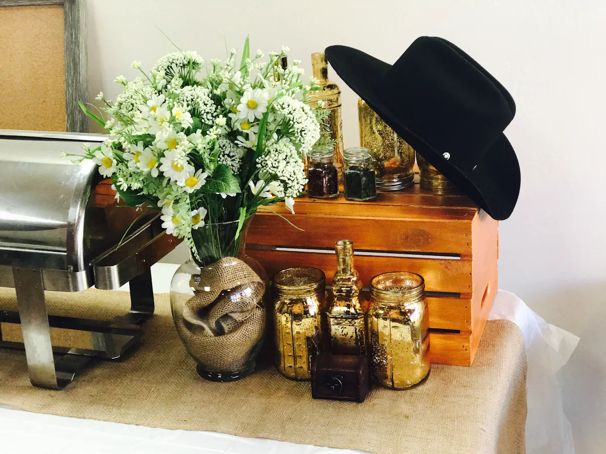a vase of flowers sitting on a chair