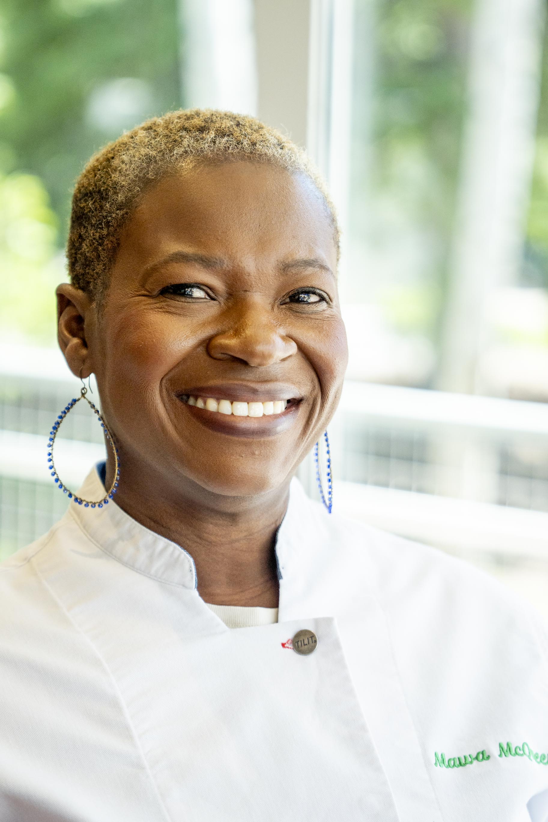 a person smiling for the camera