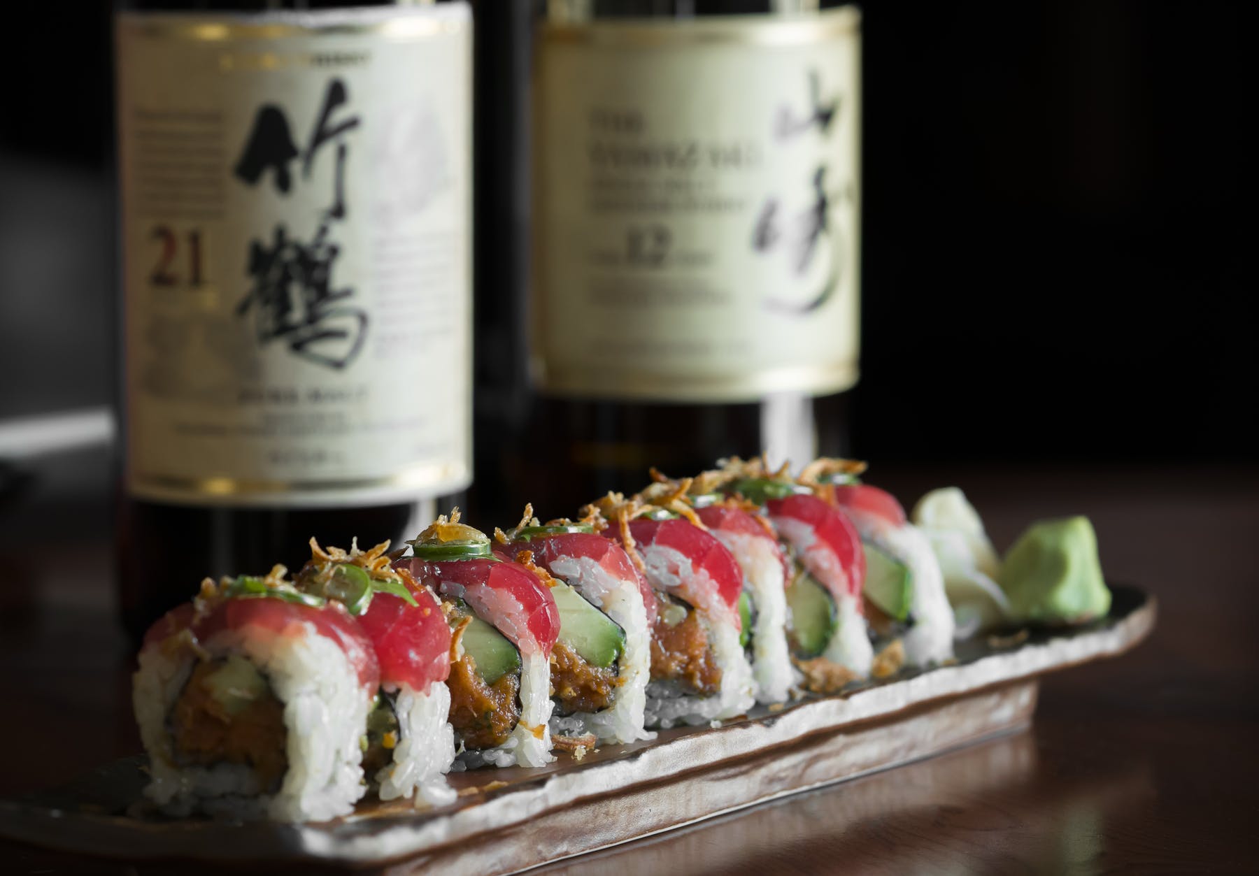 a close up of a bottle cap with a slice of cake