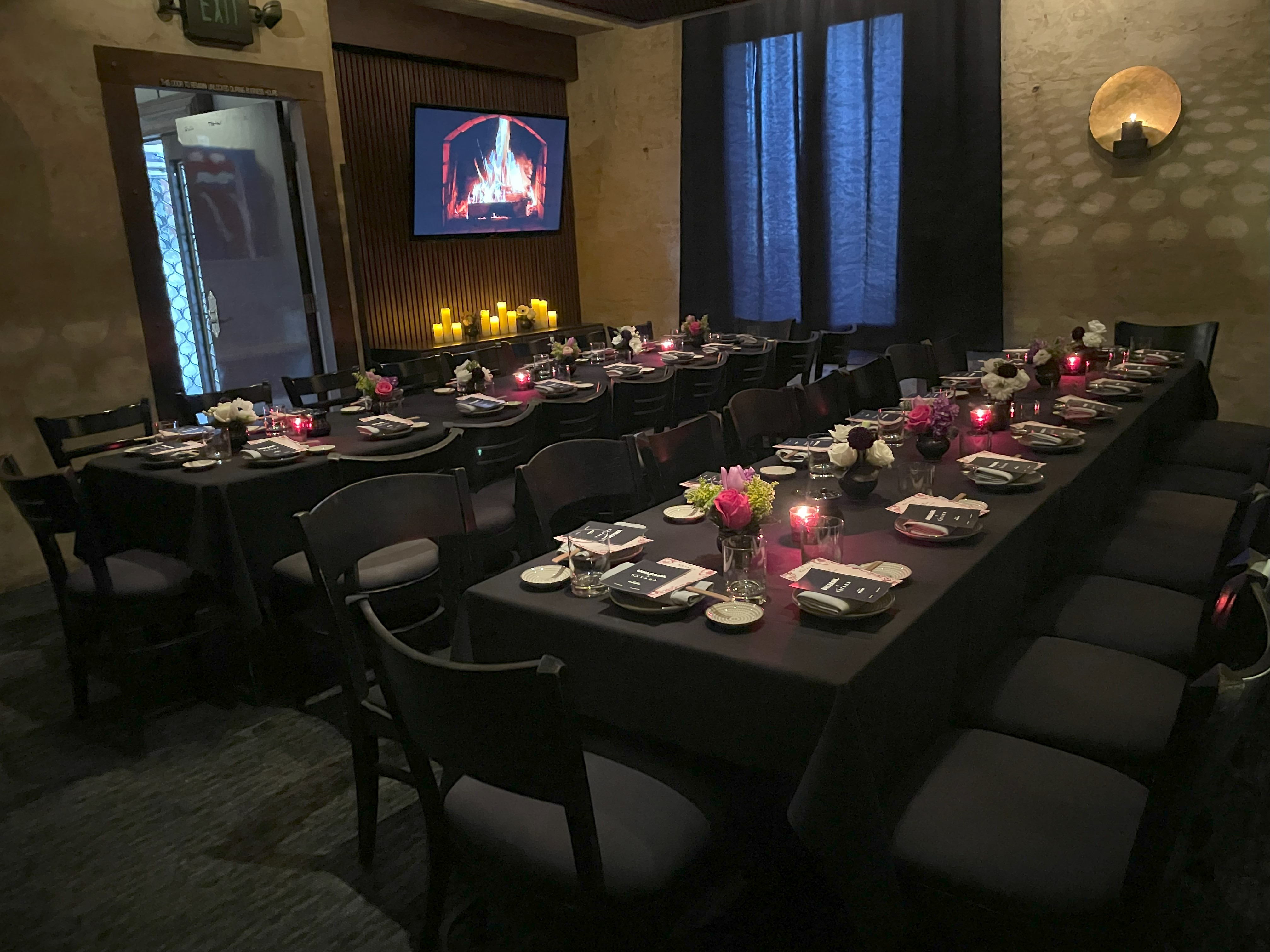a room filled with furniture and a flat screen tv
