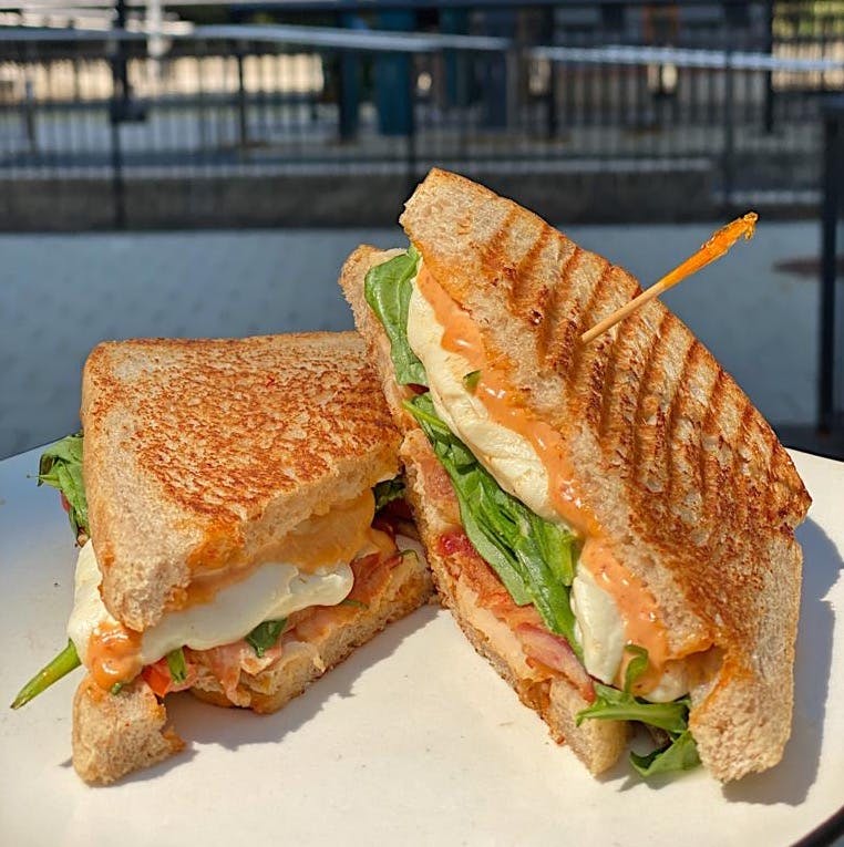 a sandwich cut in half on a plate