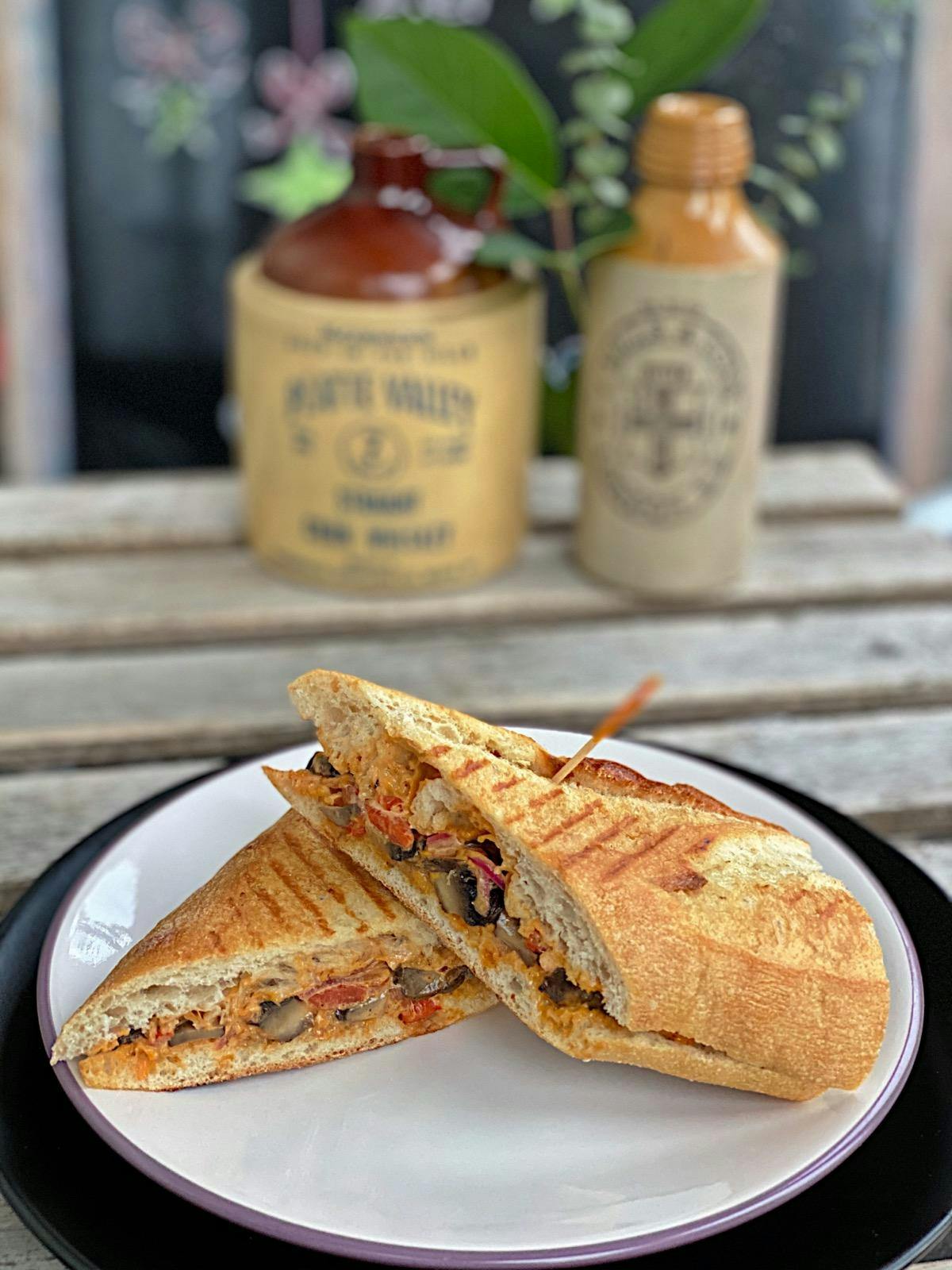a sandwich cut in half on a plate