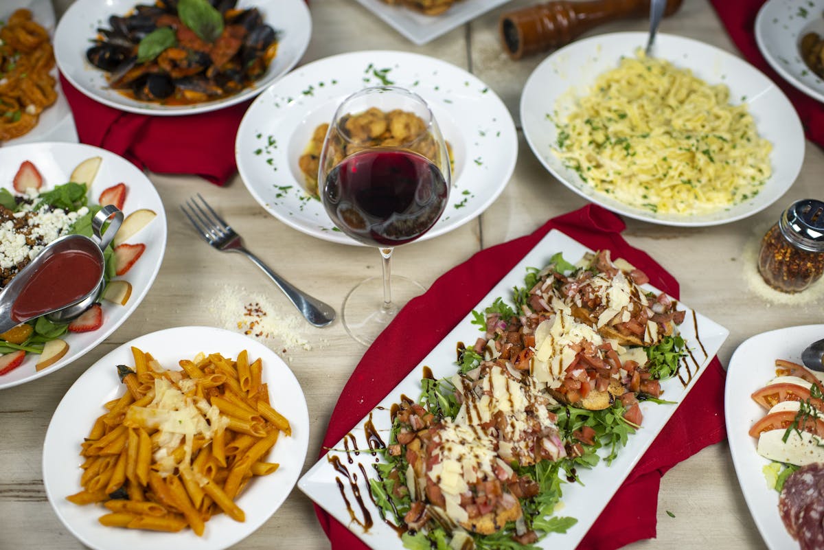 a plate is filled with different types of food on a table