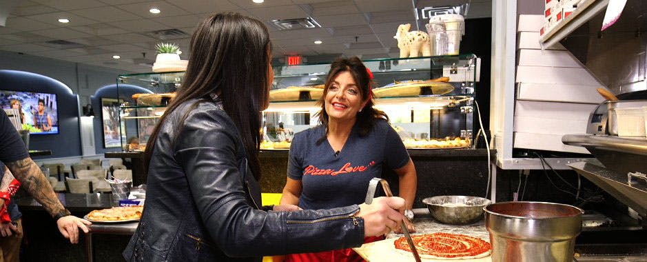 Kathy Wakile preparing food in a kitchen