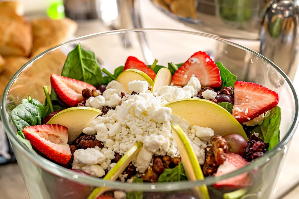 a bowl of salad on a plate