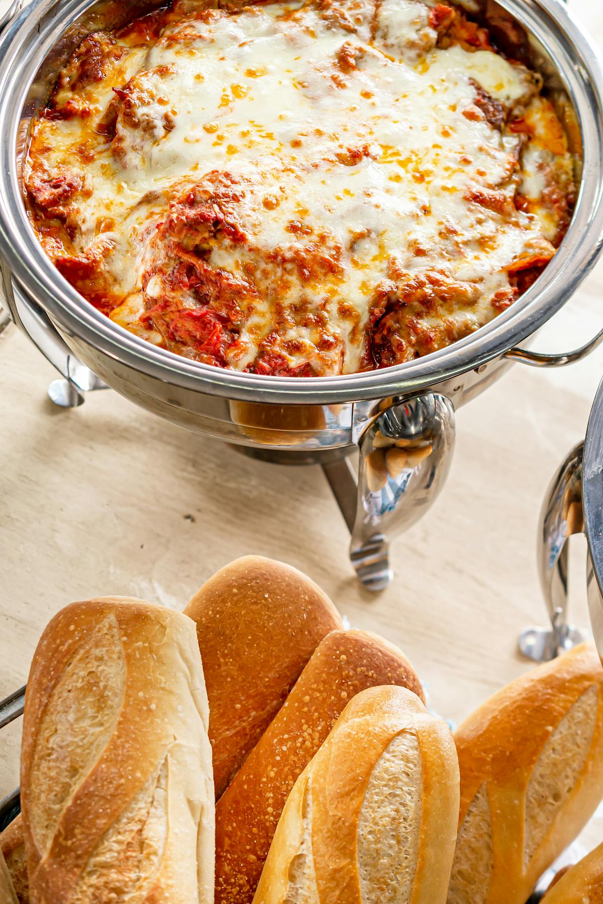 a slice of pizza sitting on top of a pan on a table