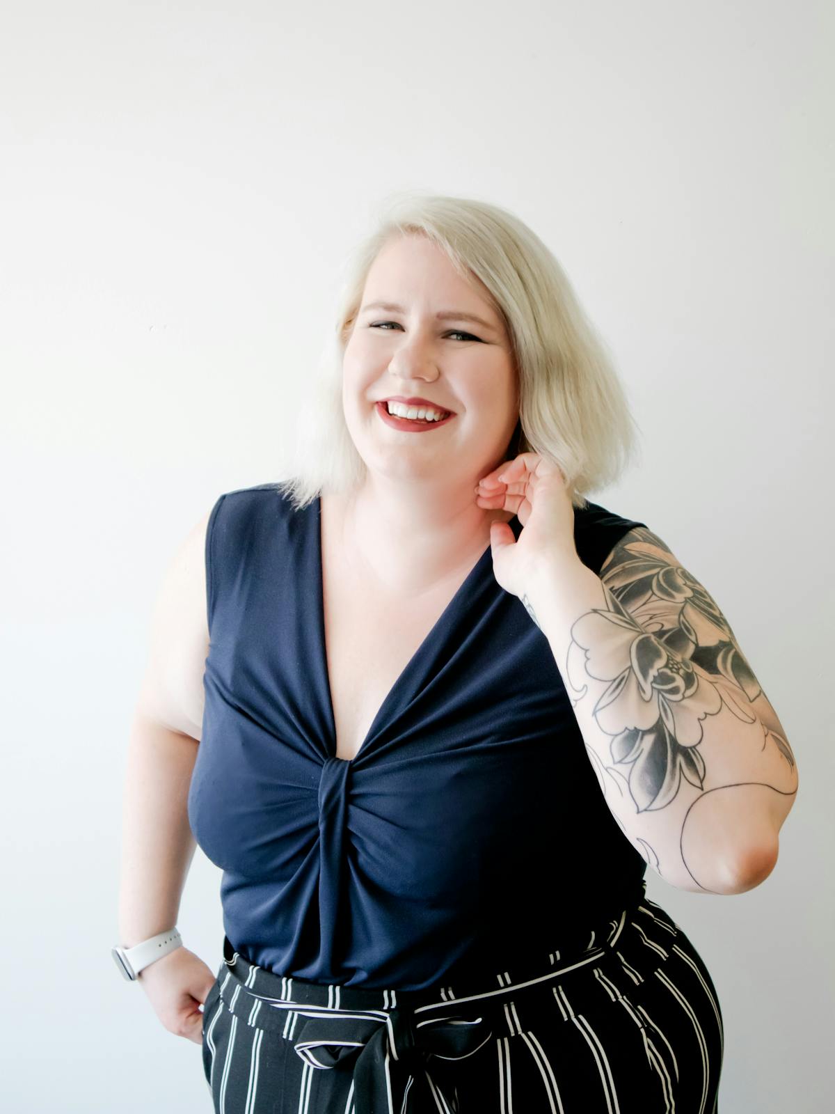 a woman wearing a blue dress