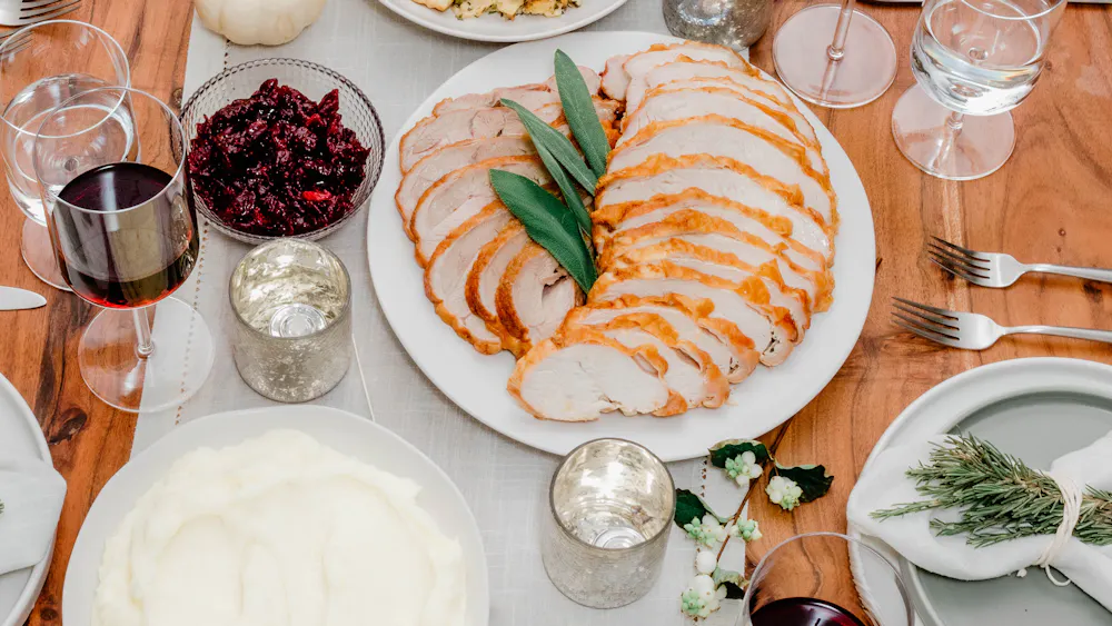 a table topped with plates of food on a plate