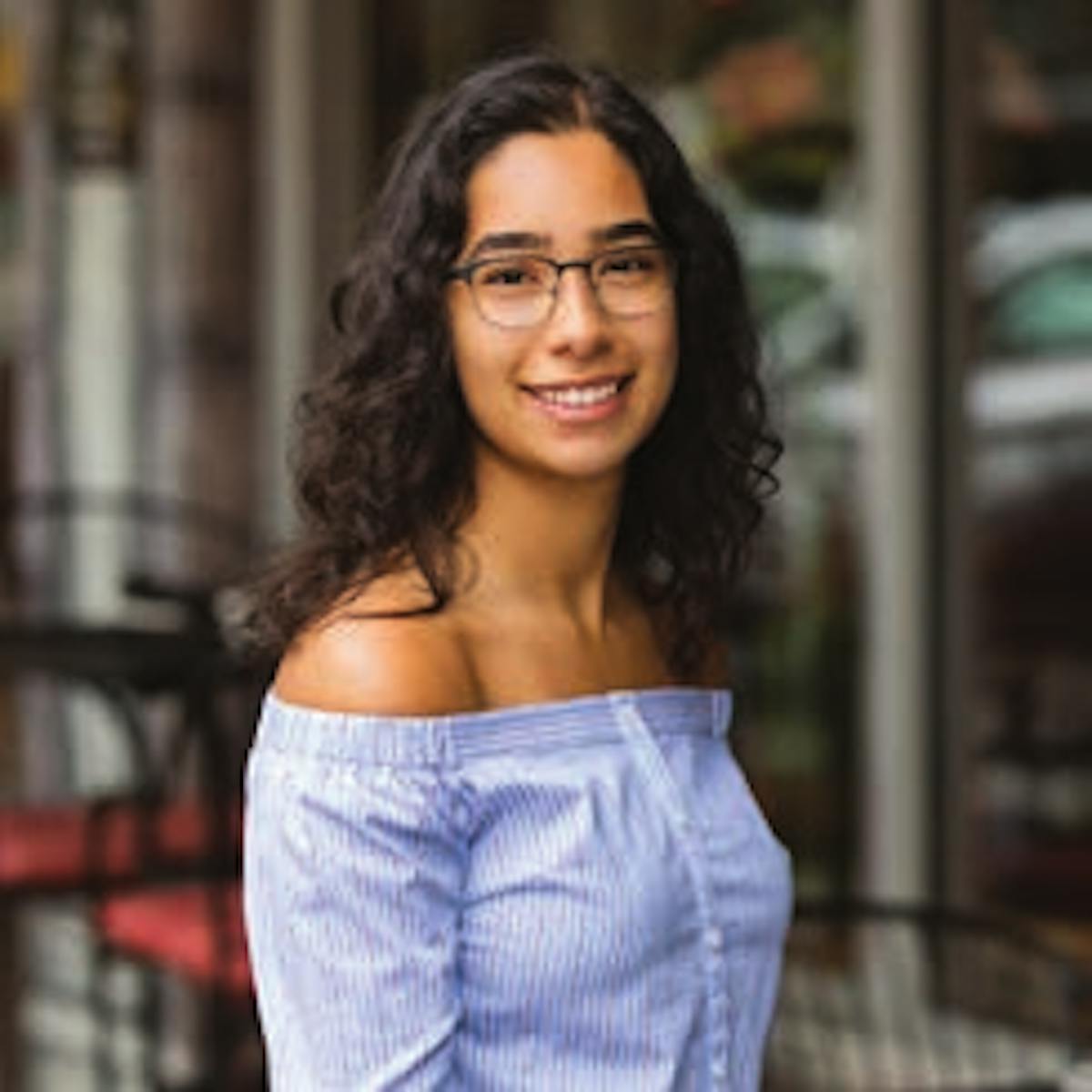 a person standing in front of a building