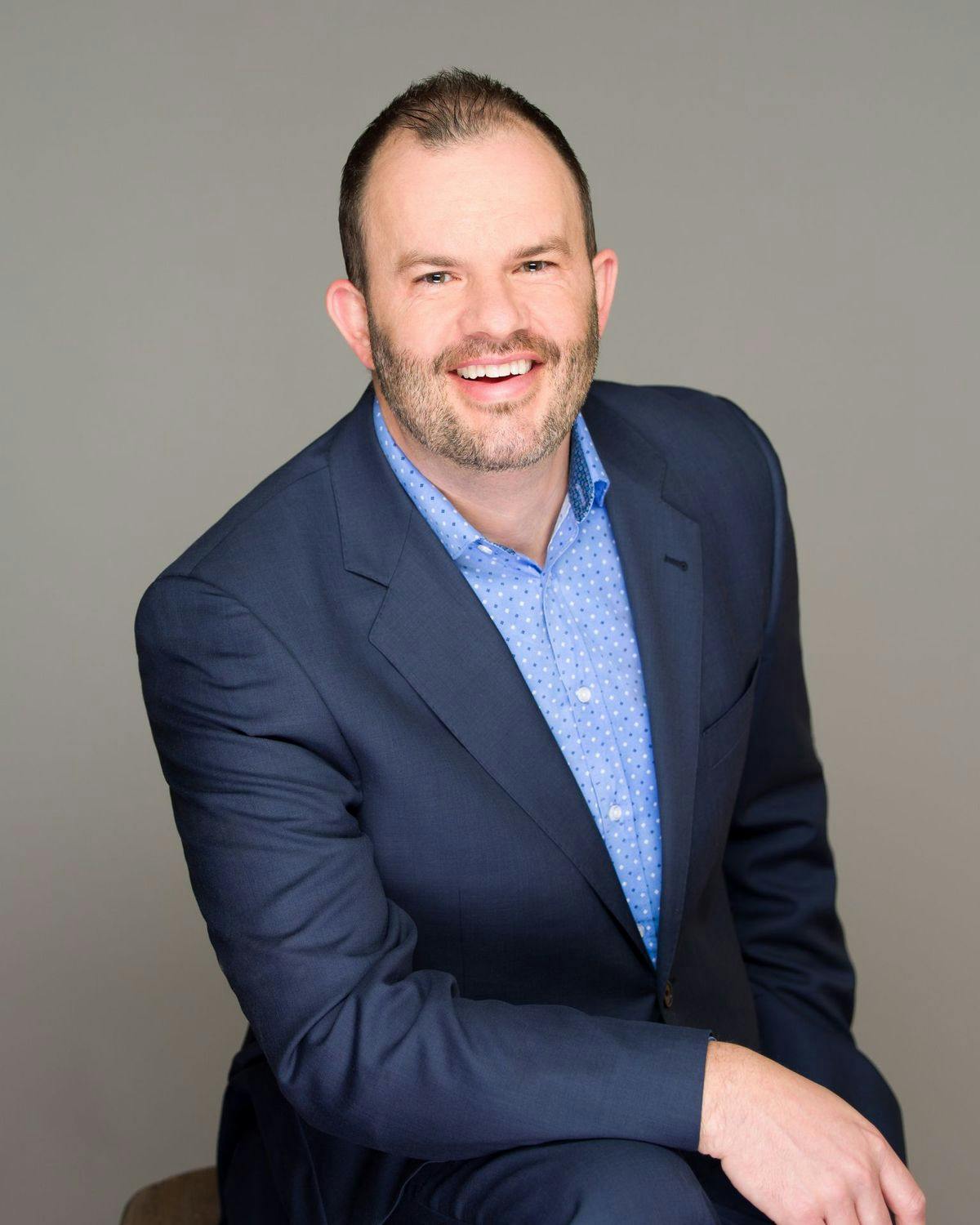 a man wearing a suit and tie