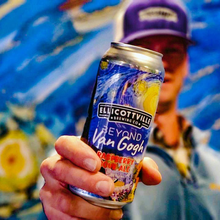 a close up of a hand holding a water bottle