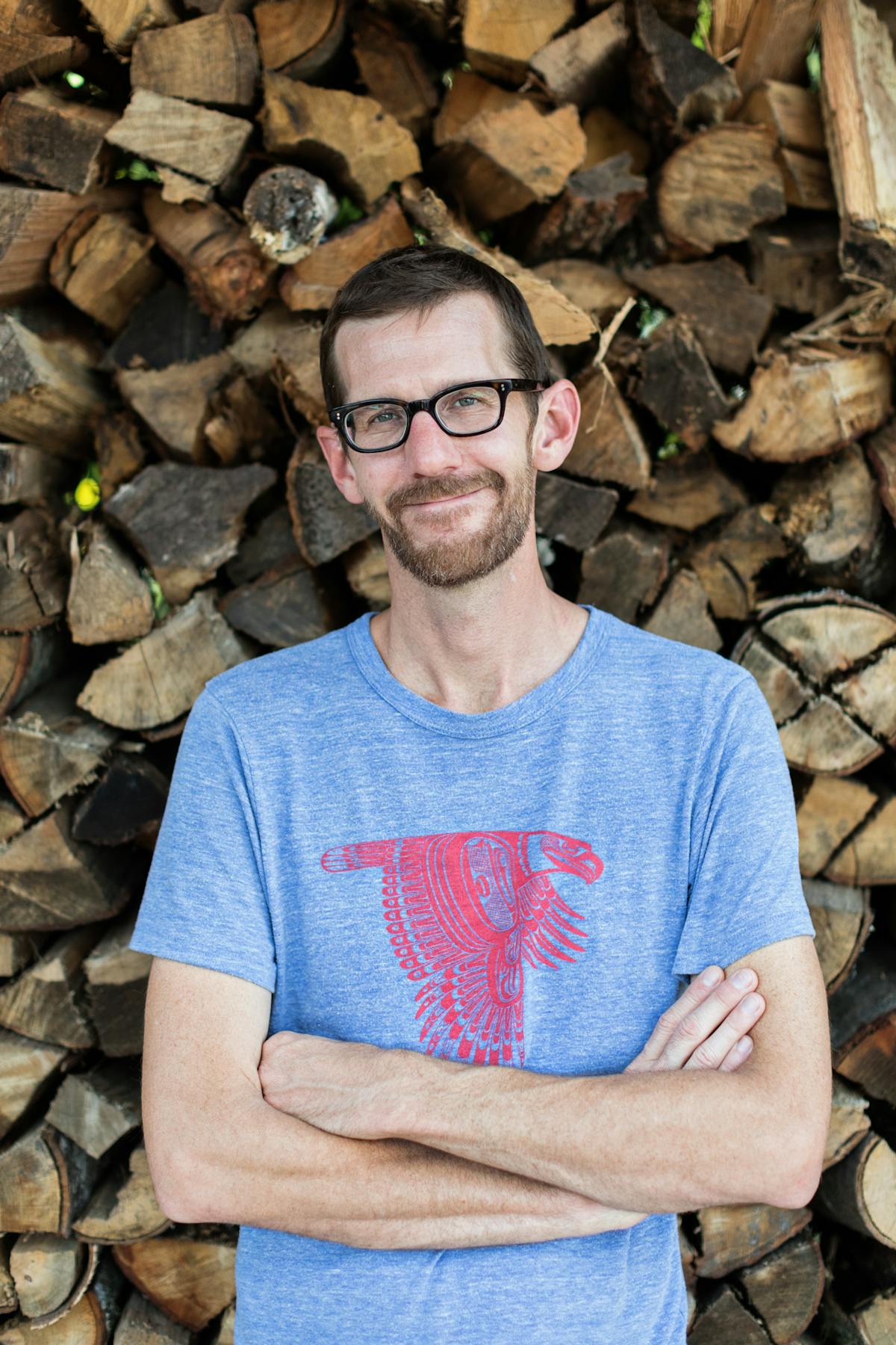 a man sitting on a rock