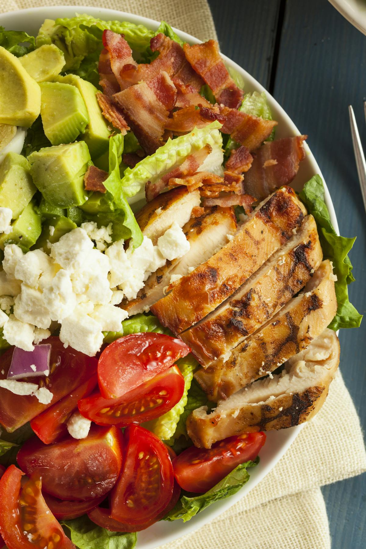 a fresh cobb salad on a plate