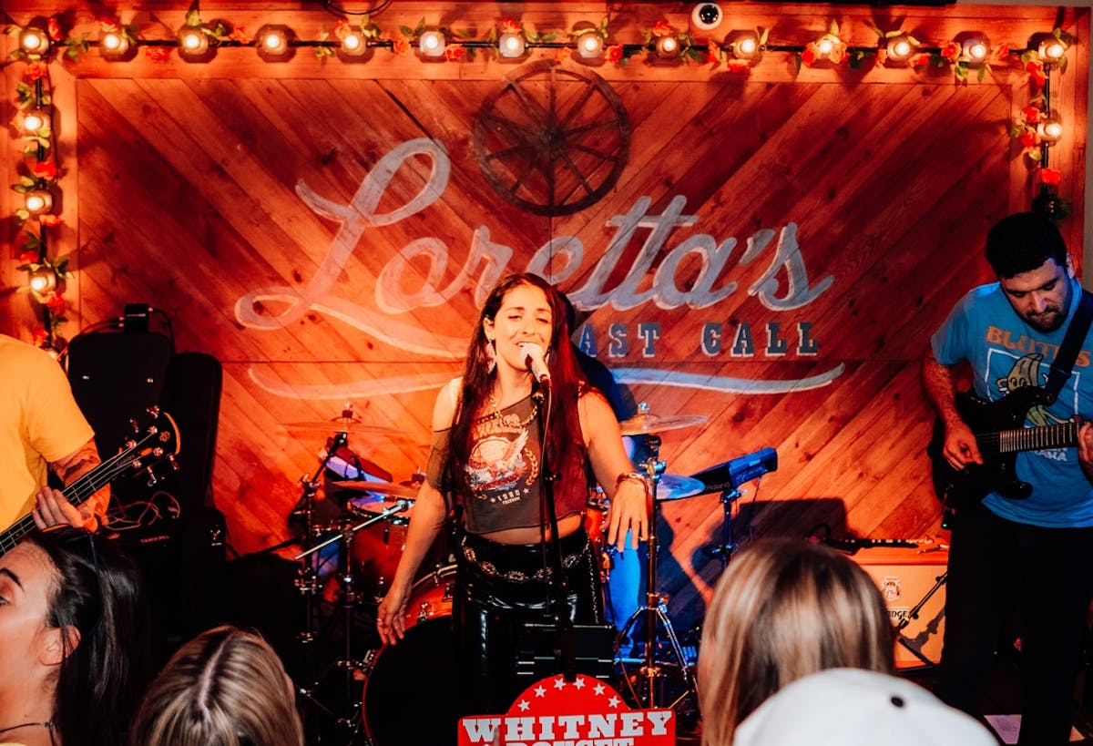 a group of people standing on a stage
